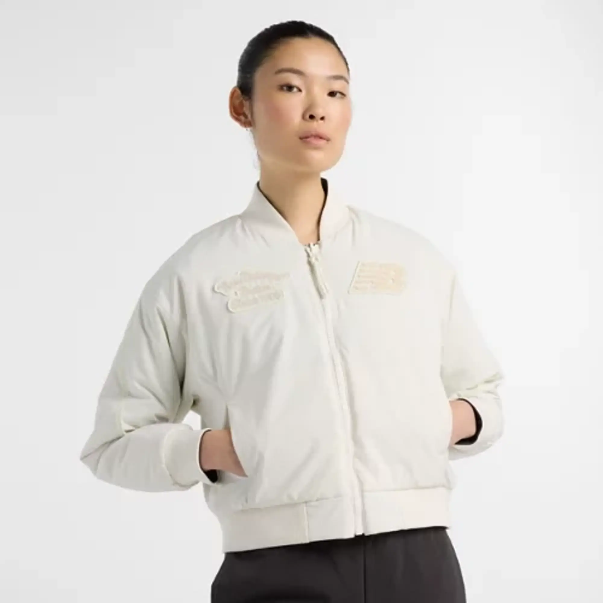 New Balance Women's NBX Lunar New Year Woven Bomber Jacket in White Polywoven