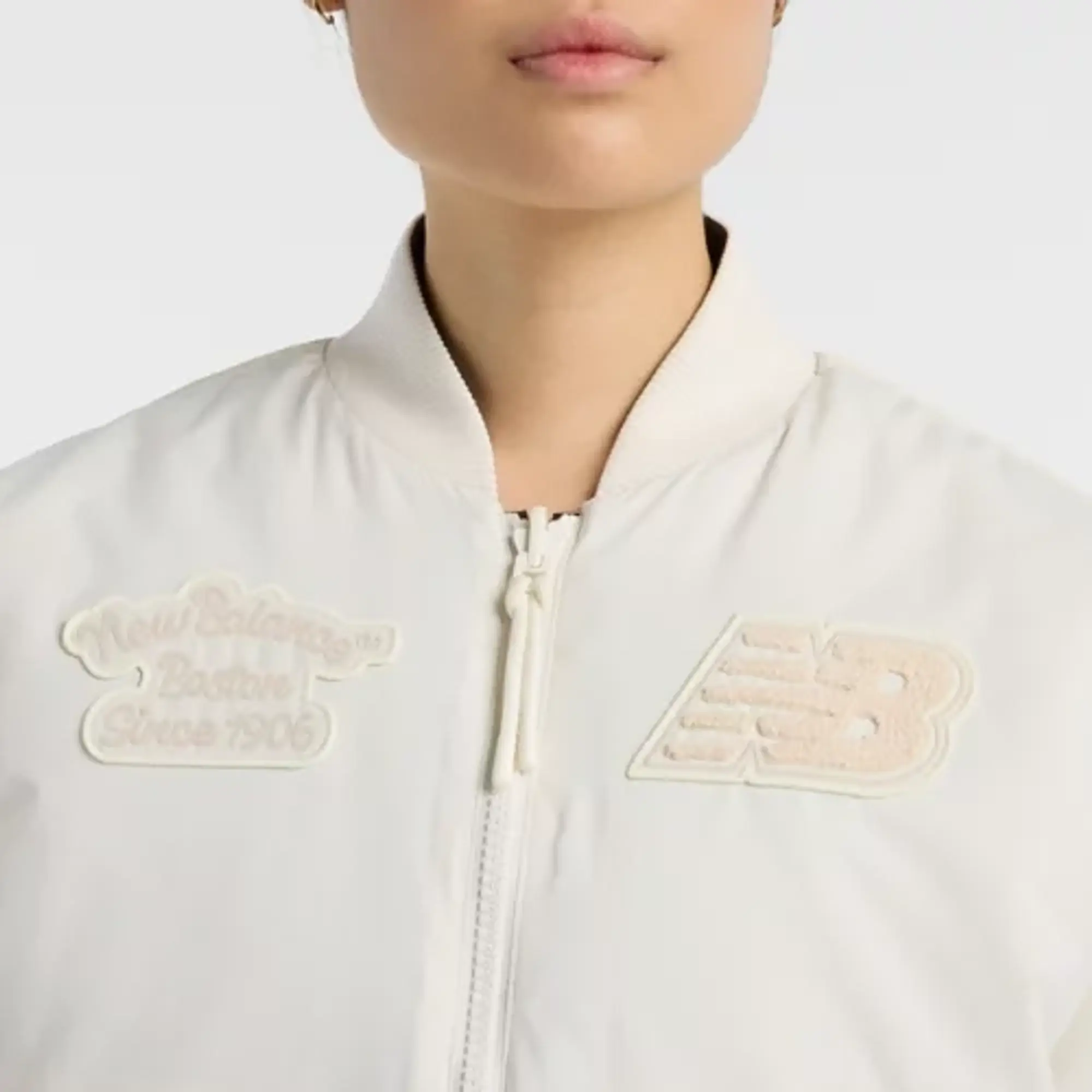 New Balance Women's NBX Lunar New Year Woven Bomber Jacket in White Polywoven