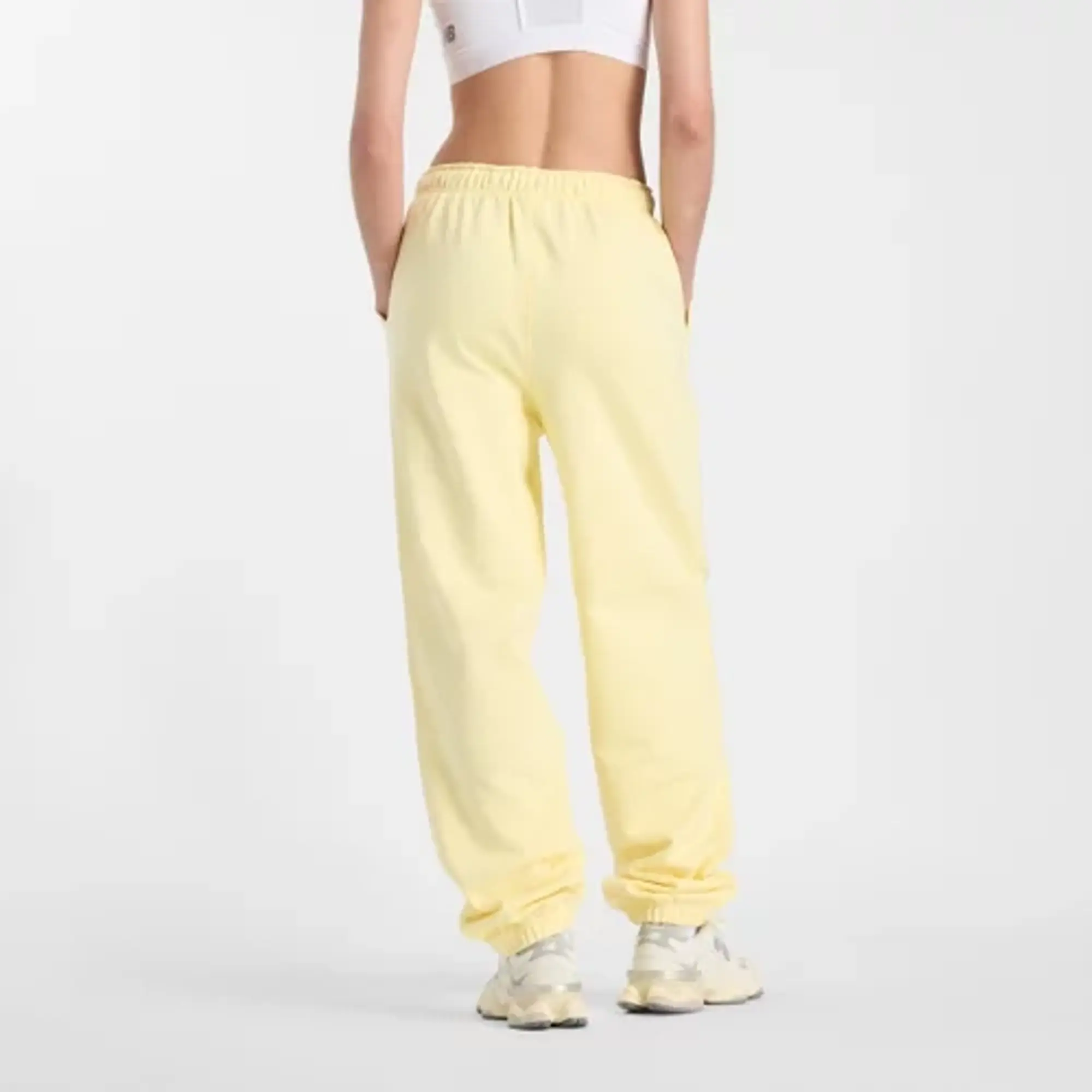 New Balance Women's Athletics French Terry Jogger in Yellow Cotton