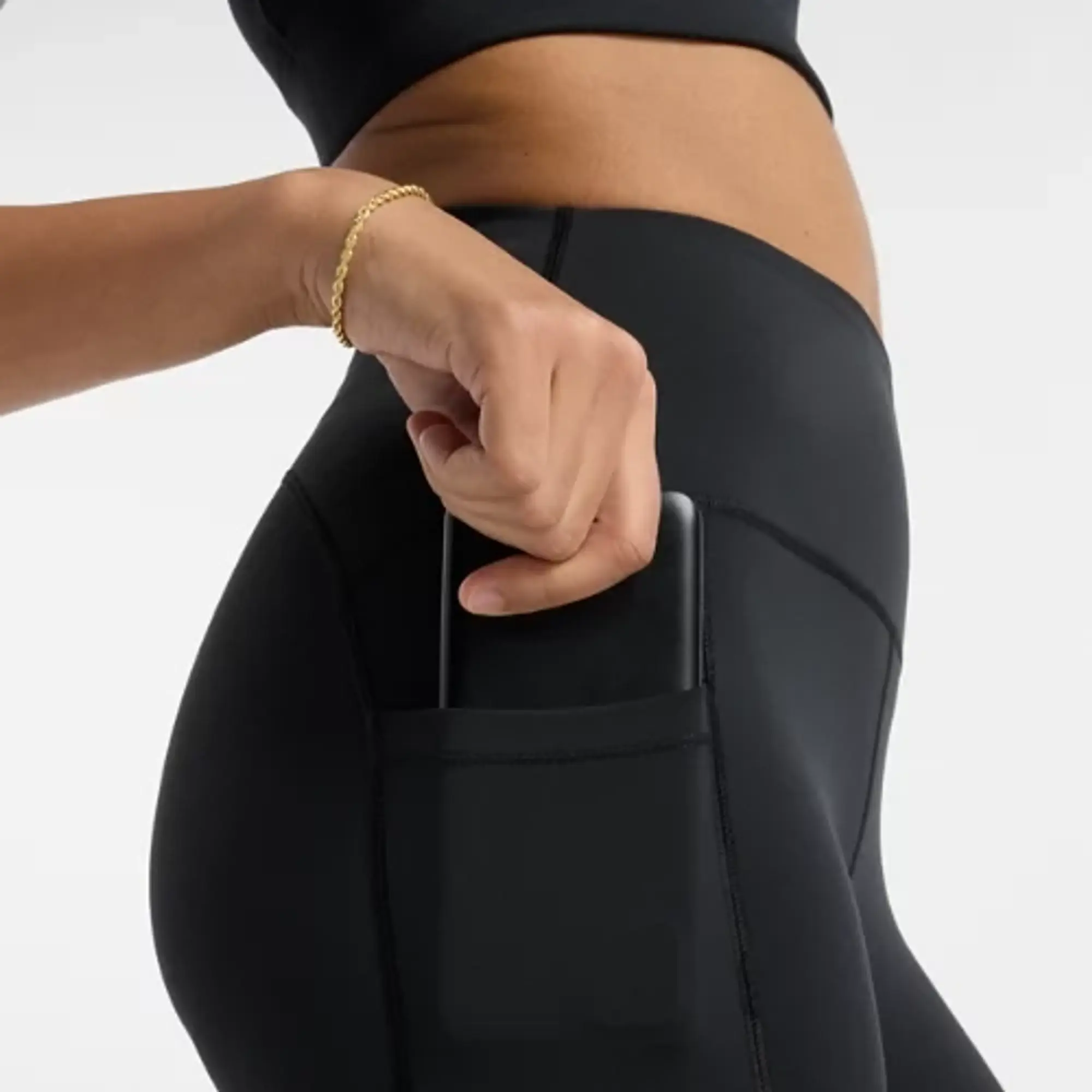 New Balance Women's NB Sleek Pocket High Rise Legging 25 in Black Poly Knit