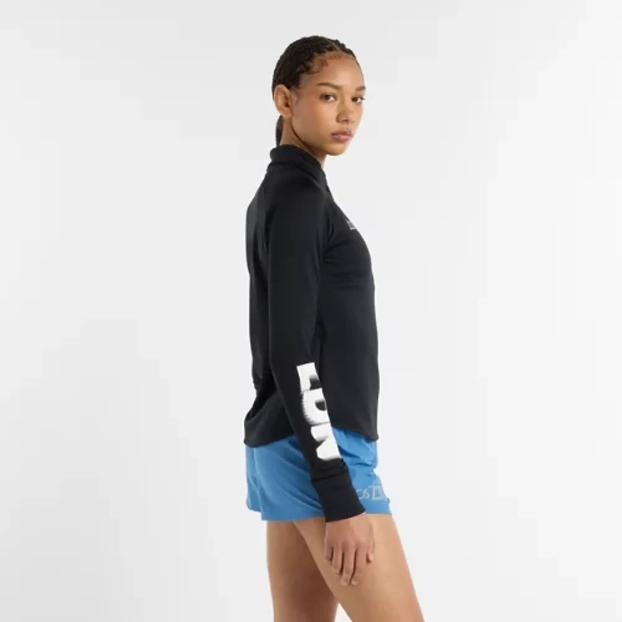 New Balance Women's London Edition Athletics Heat Grid Half Zip in Black Poly Knit