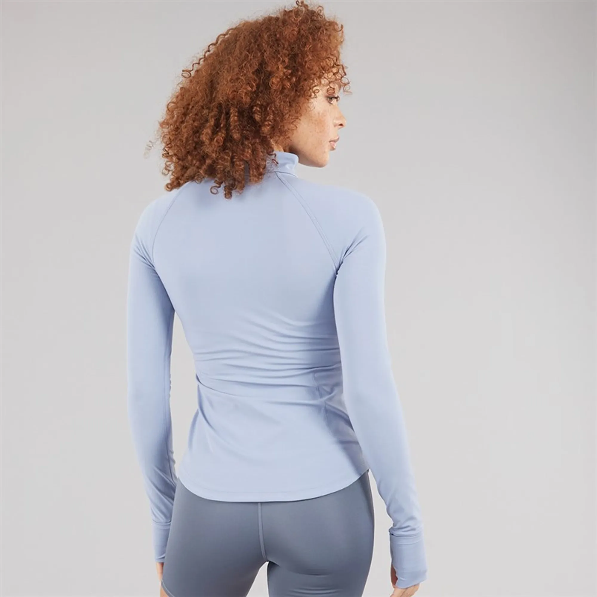 New Balance Women's London Edition NB Harmony Half Zip in Blue Poly Knit