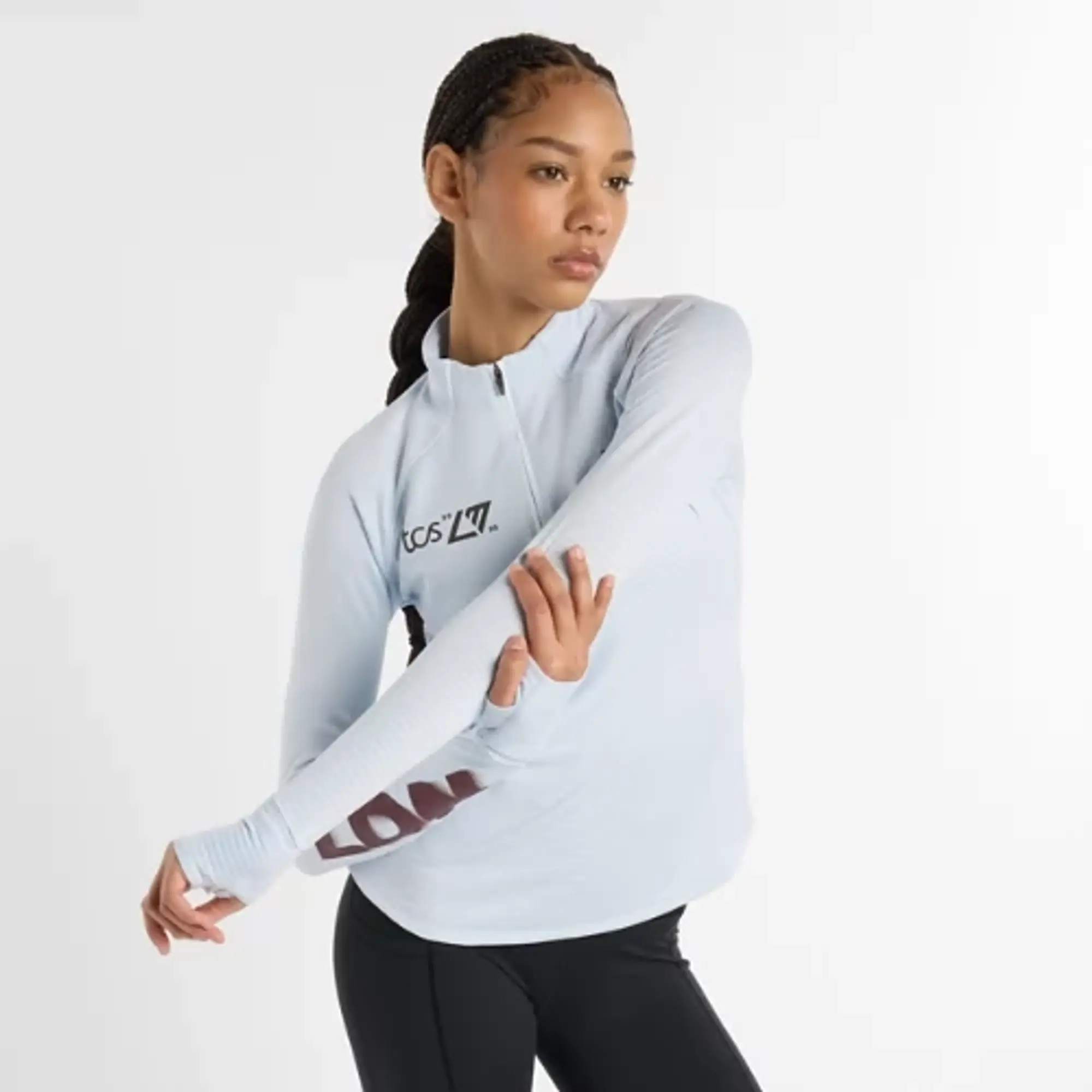 New Balance Women's London Edition Athletics Heat Grid Half Zip in Blue Poly Knit