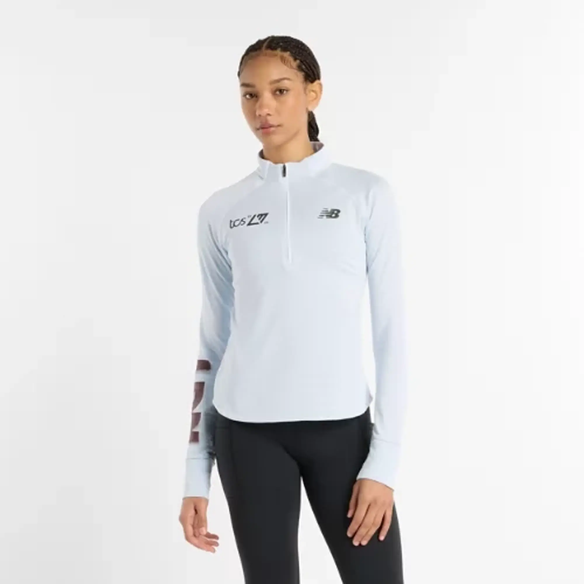New Balance Women's London Edition Athletics Heat Grid Half Zip in Blue Poly Knit