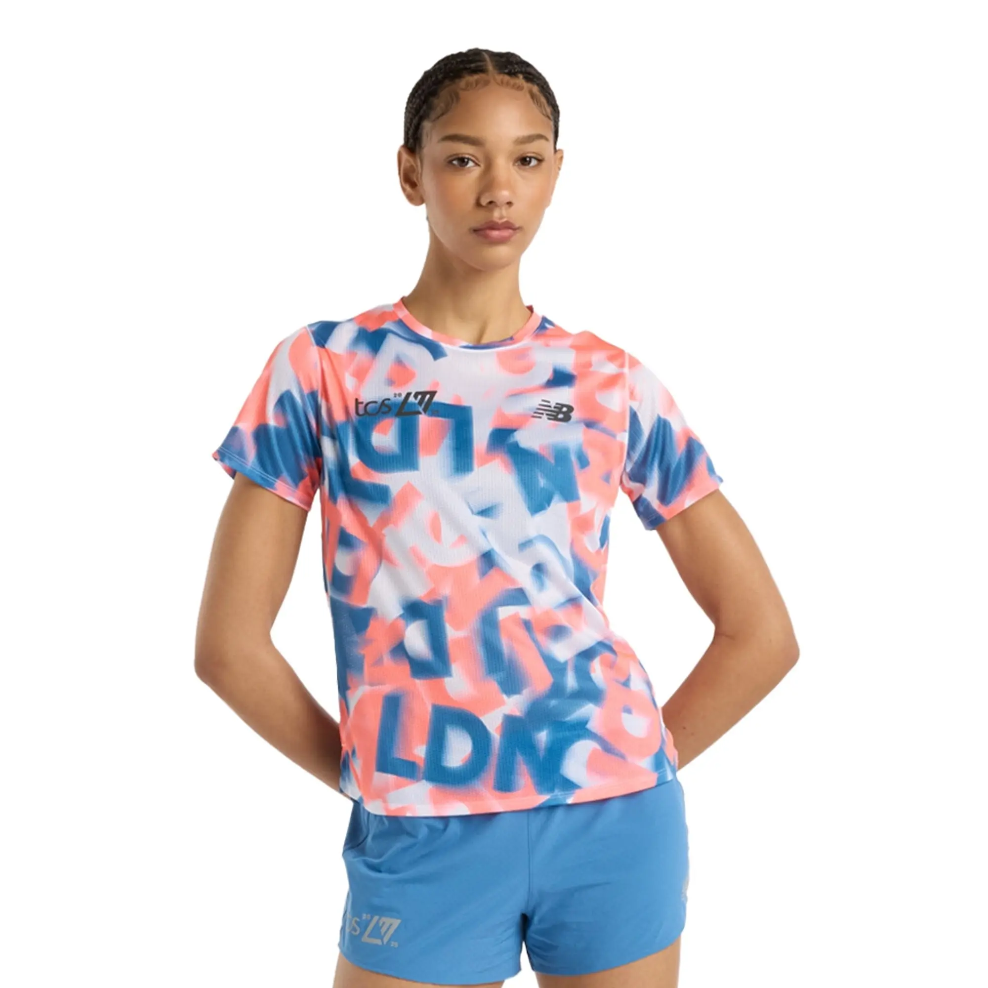 New Balance Women's London Edition Printed Athletics T-Shirt in Blue/Pink Poly Knit