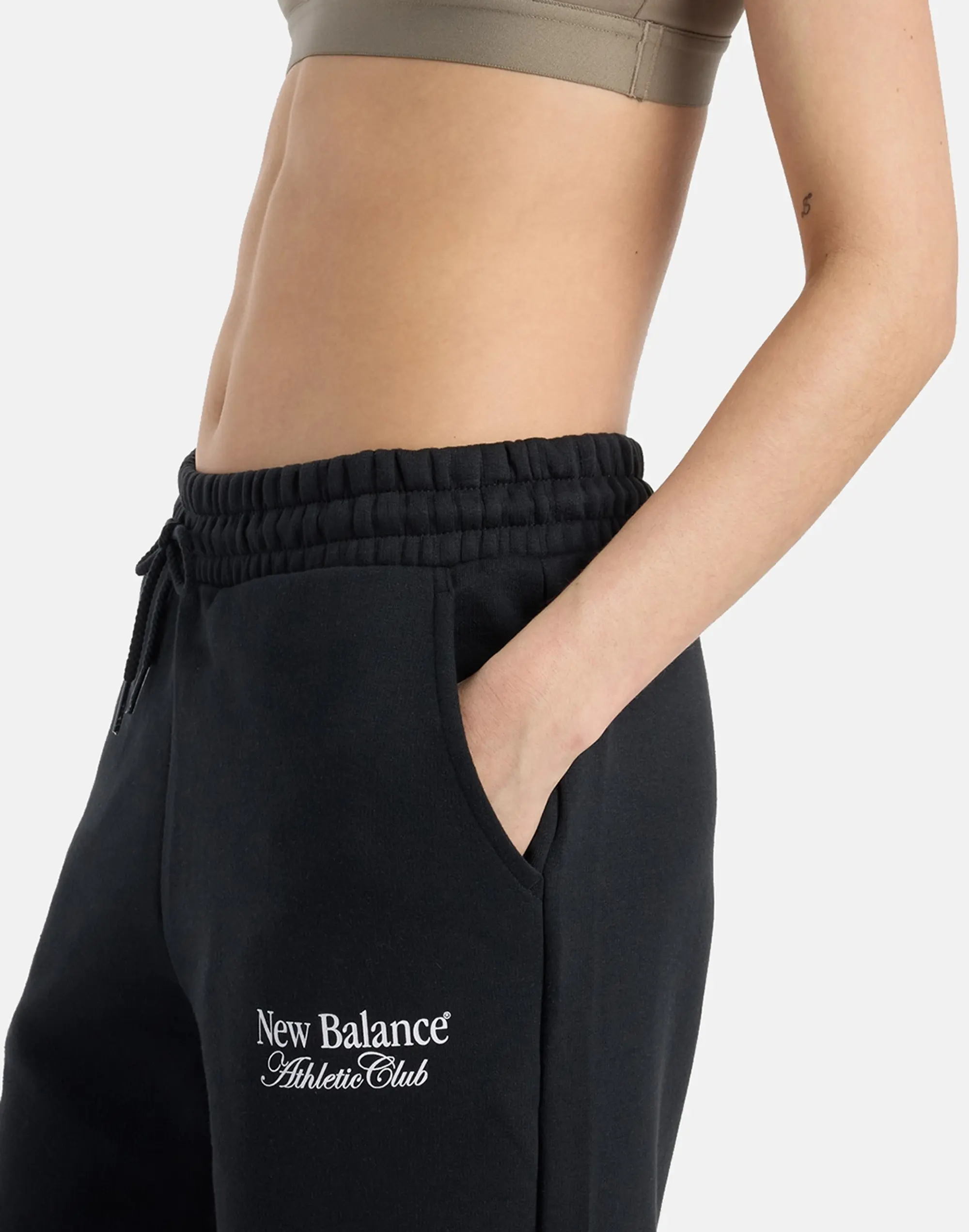 Women's New Balance Linear Heritage Wide Leg Joggers in Black
