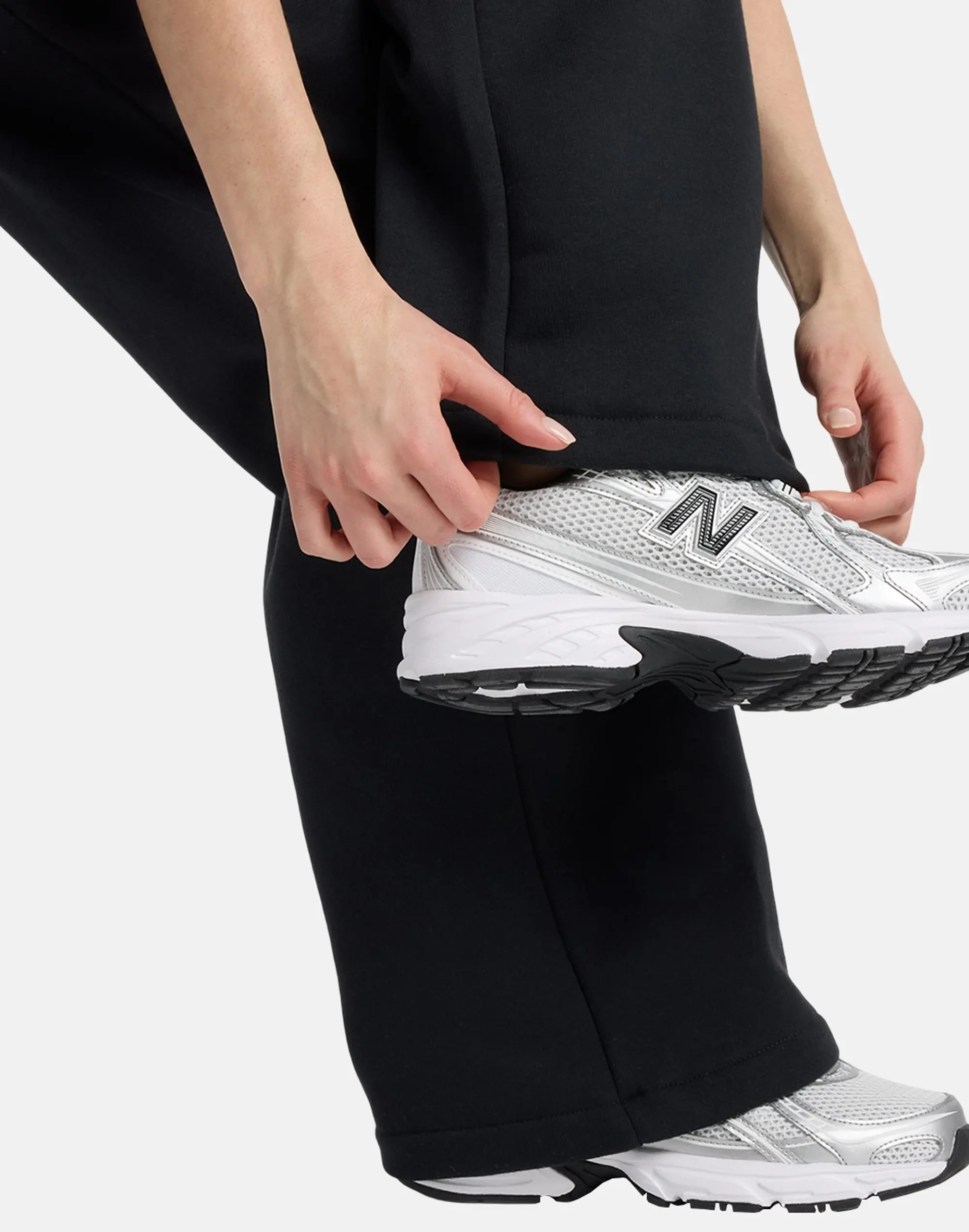 Women's New Balance Linear Heritage Wide Leg Joggers in Black