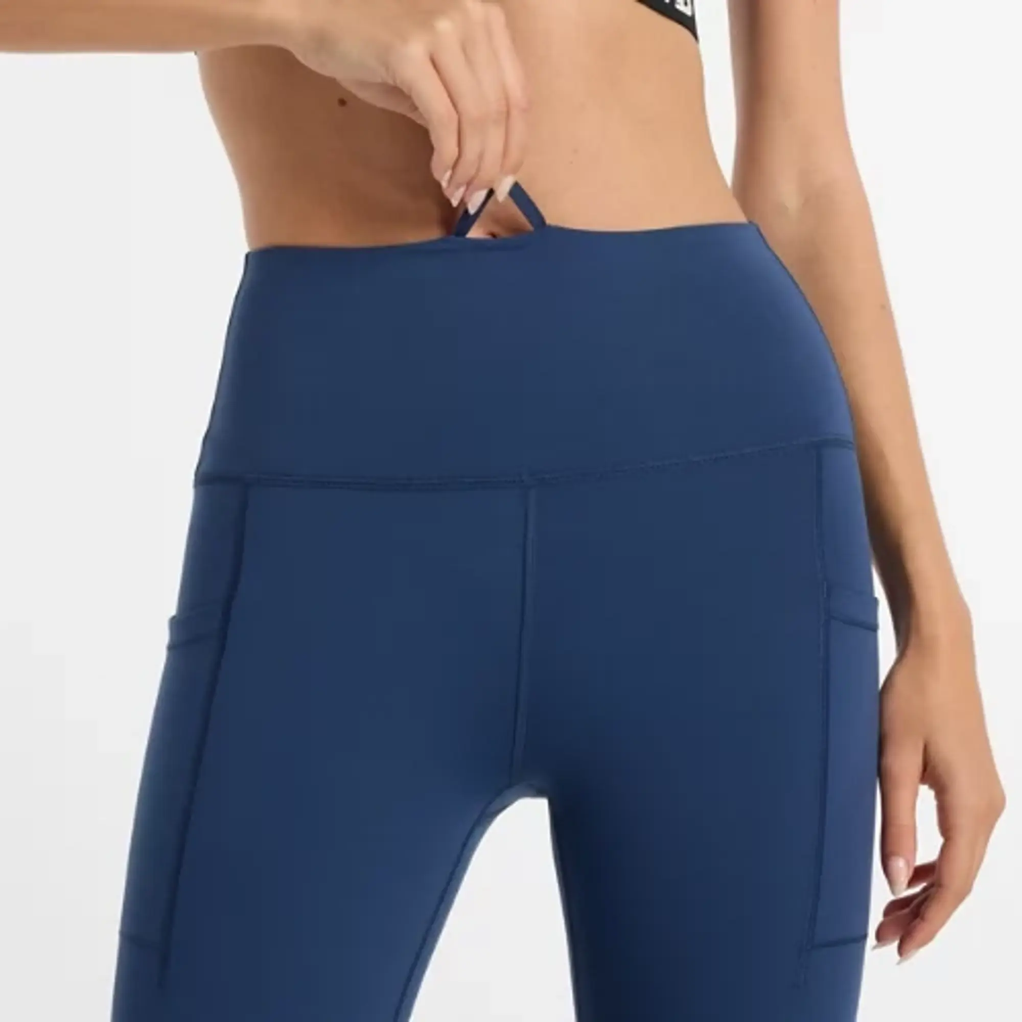 New Balance Women's NB Sleek Pocket High Rise Legging 27 in Blue Poly Knit