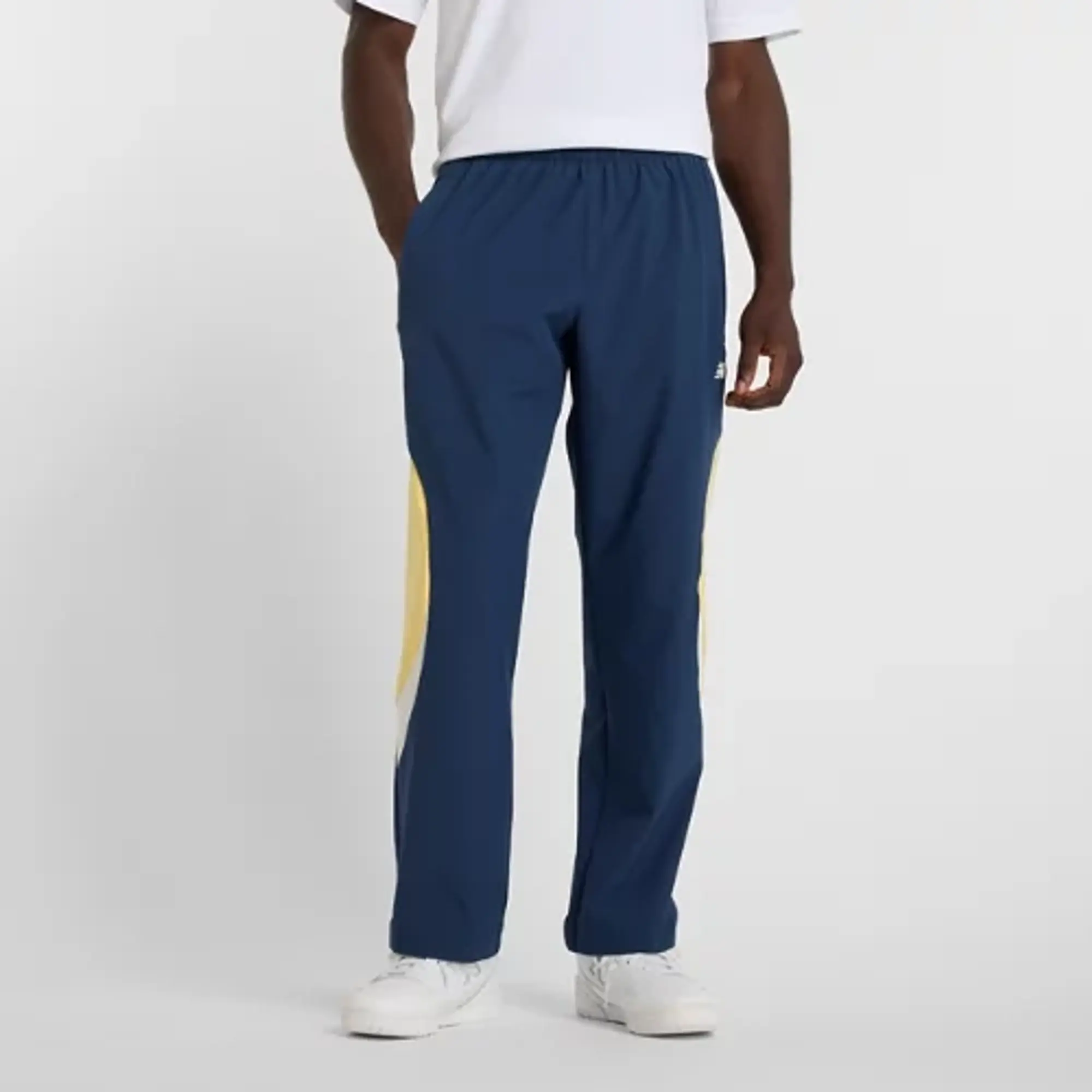 New Balance Men's In Game Woven Track Pant in Blue Polywoven