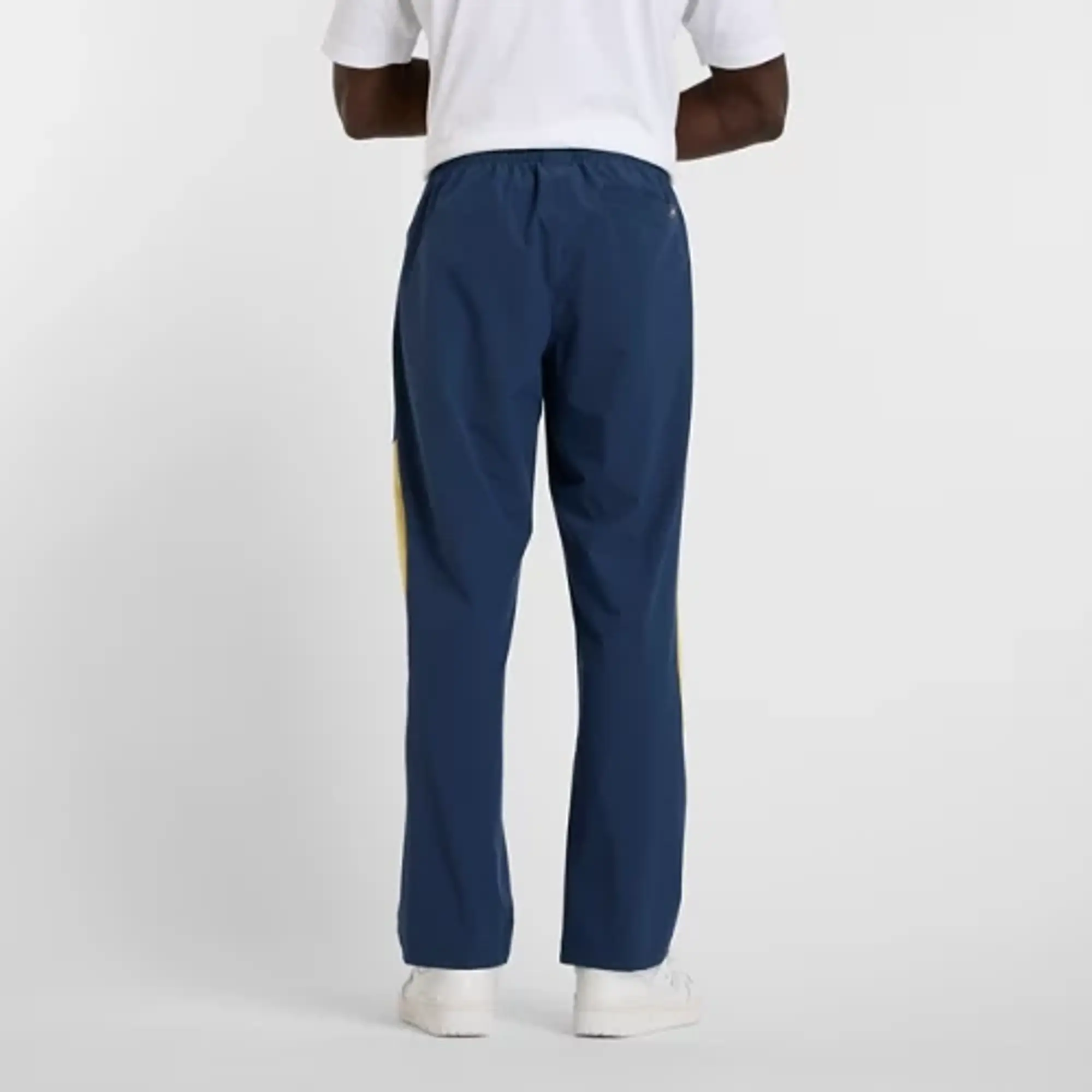 New Balance Men's In Game Woven Track Pant in Blue Polywoven