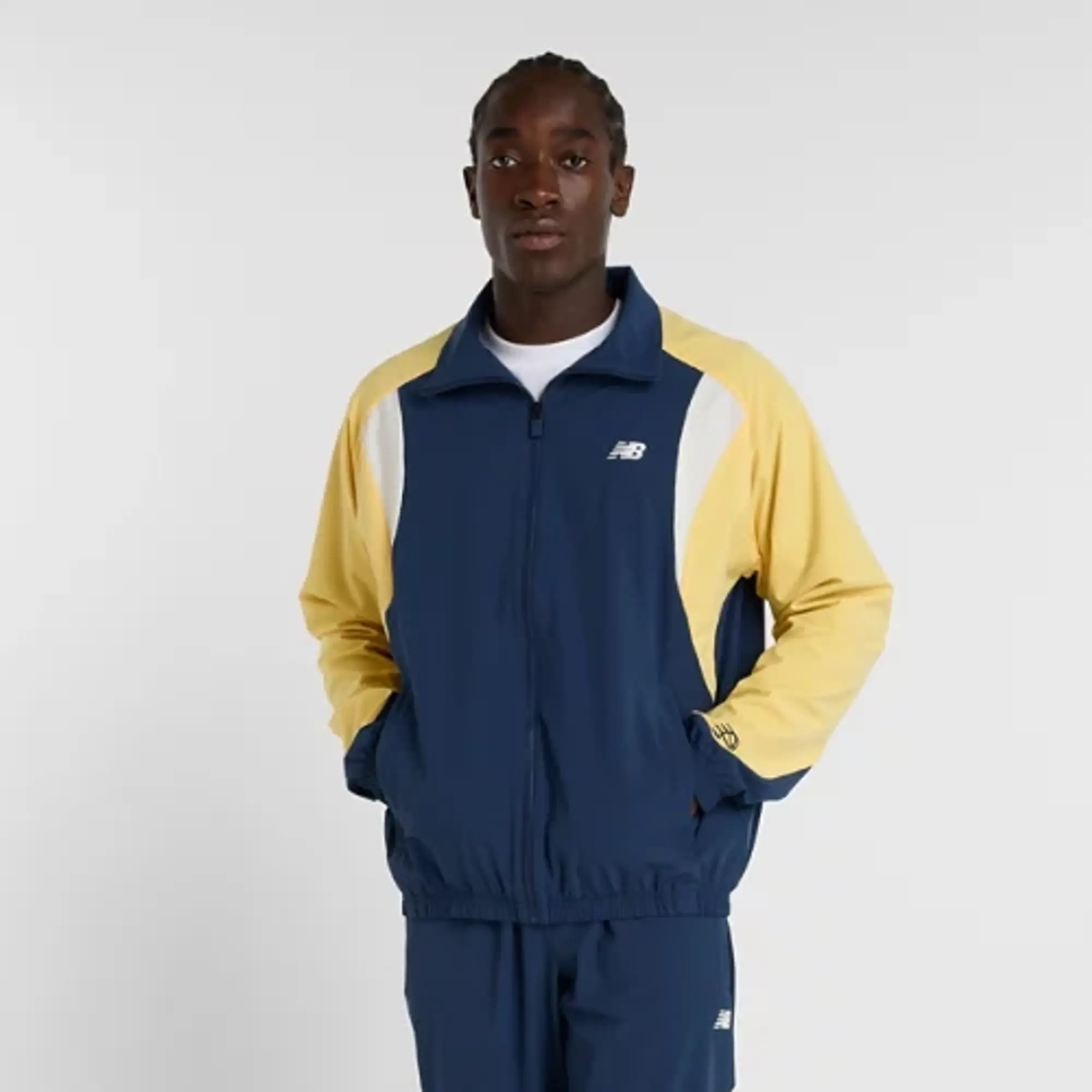 New Balance Men's In Game Woven Track Jacket in Blue Polywoven