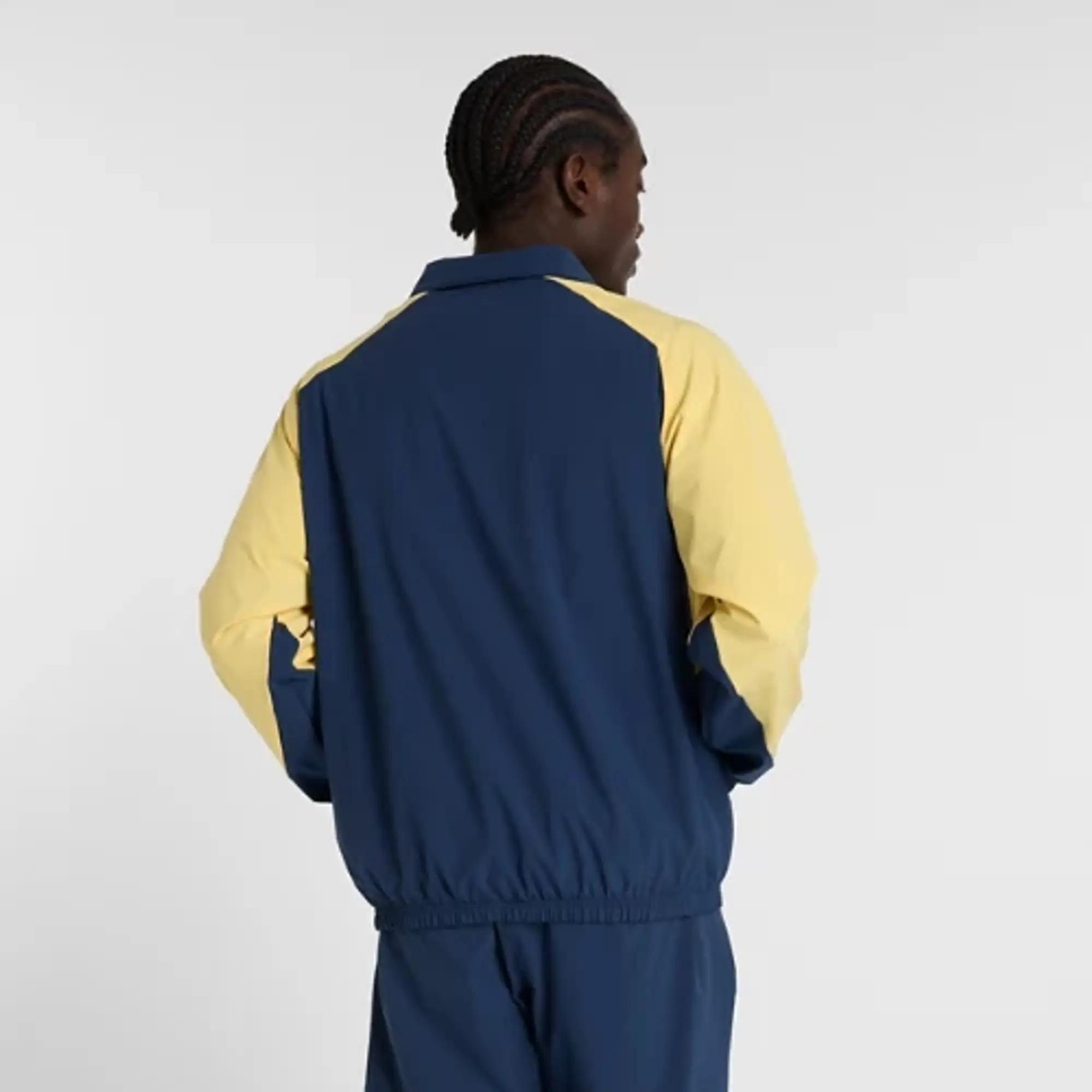 New Balance Men's In Game Woven Track Jacket in Blue Polywoven