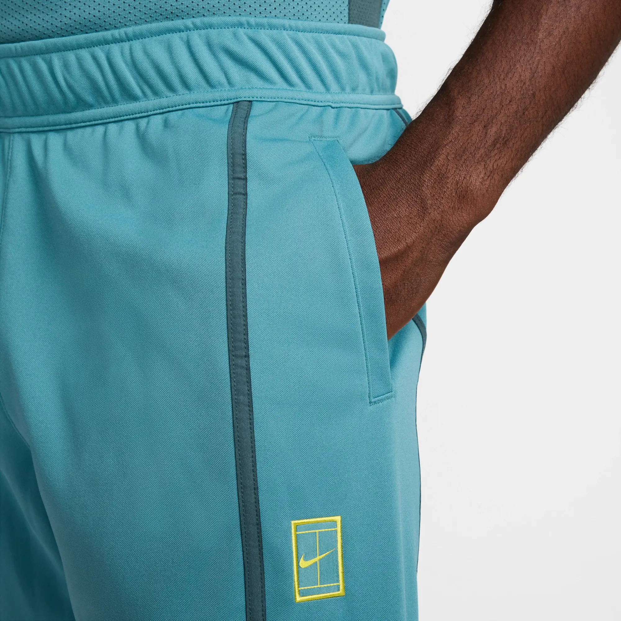 NikeCourt Heritage Men's Tennis Trousers - Green - Polyester