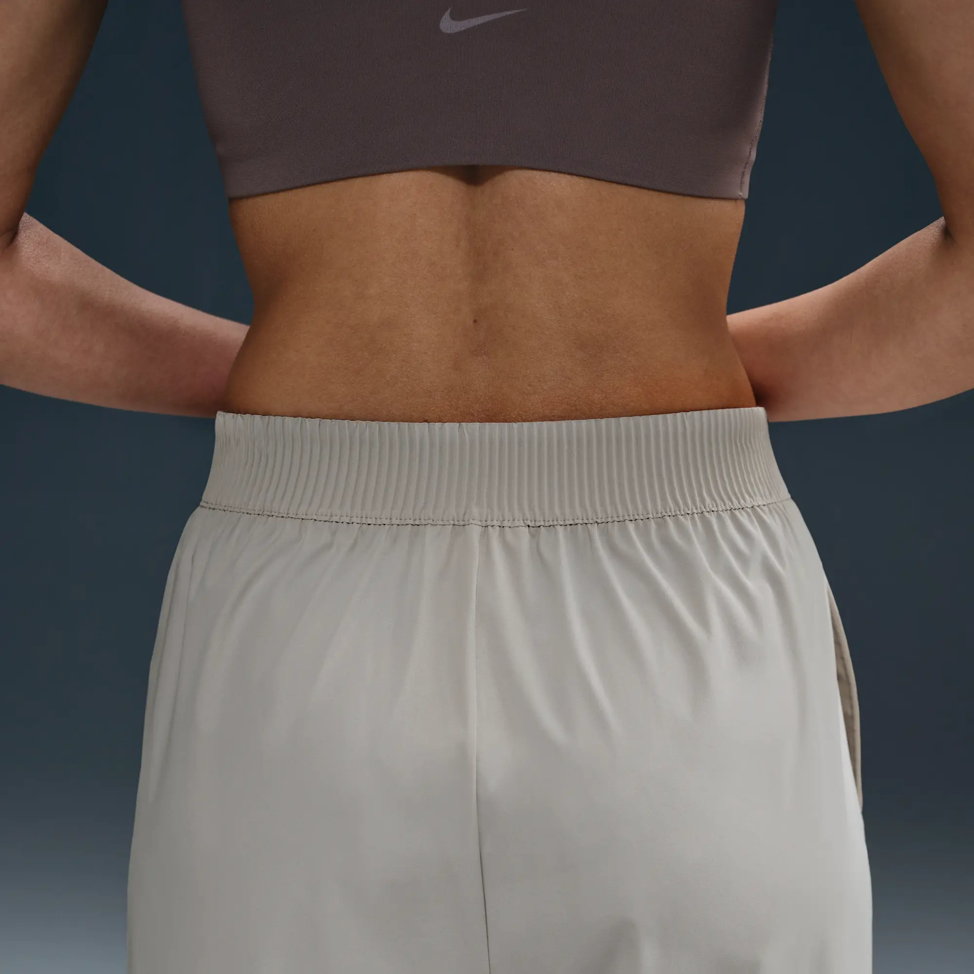 Nike 24.7 PerfectStretch Women's Dri-FIT High-Waisted Loose Wide-Leg Trousers - Brown - Sustainable Materials