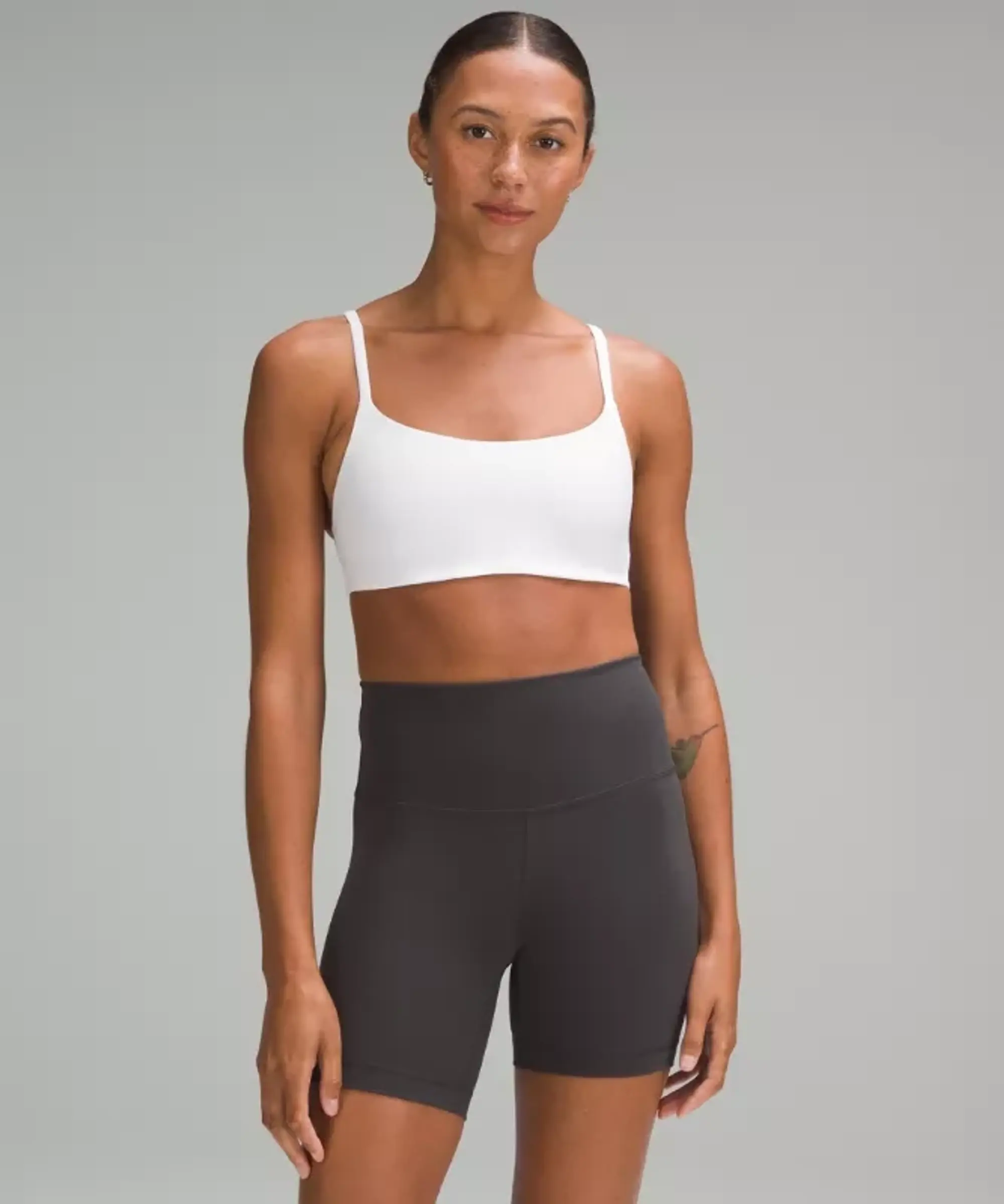 lululemon – Women's Wunder Train Strappy Racer Sports Bra Light Support, A/B Cup – Color White – Size 14