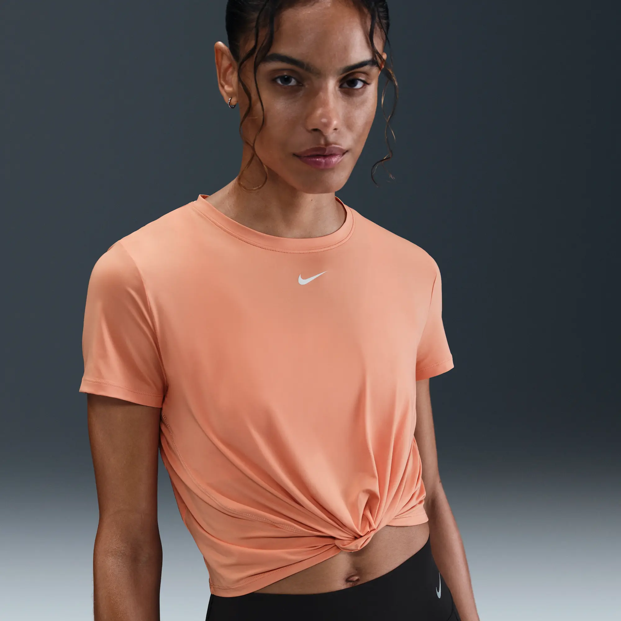 Nike One Classic Women's Dri-FIT Twist Short-Sleeve Top - Orange - Polyester/Elastane