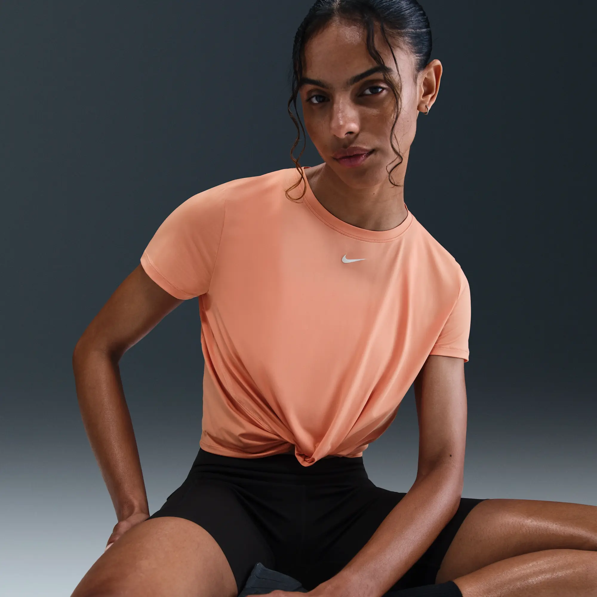 Nike One Classic Women's Dri-FIT Twist Short-Sleeve Top - Orange - Polyester/Elastane