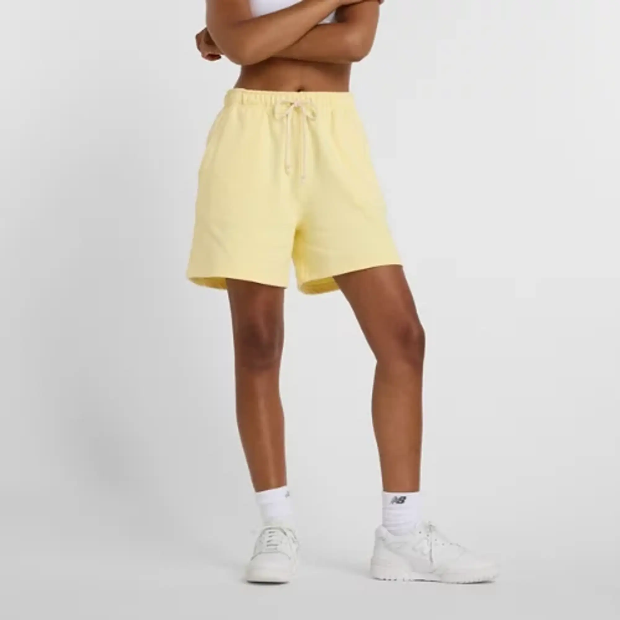 New Balance Women's Athletics French Terry Short in Yellow Cotton Fleece