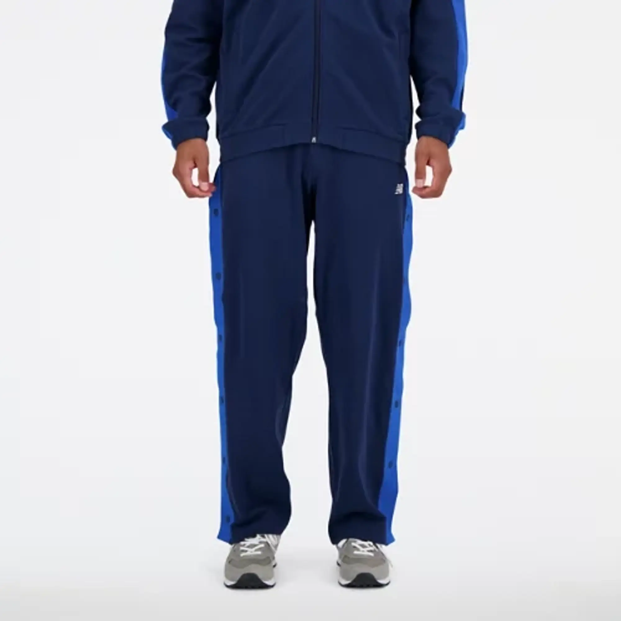 New Balance Men's Sportswear's Greatest Hits Snap Pant in Blue Poly Knit