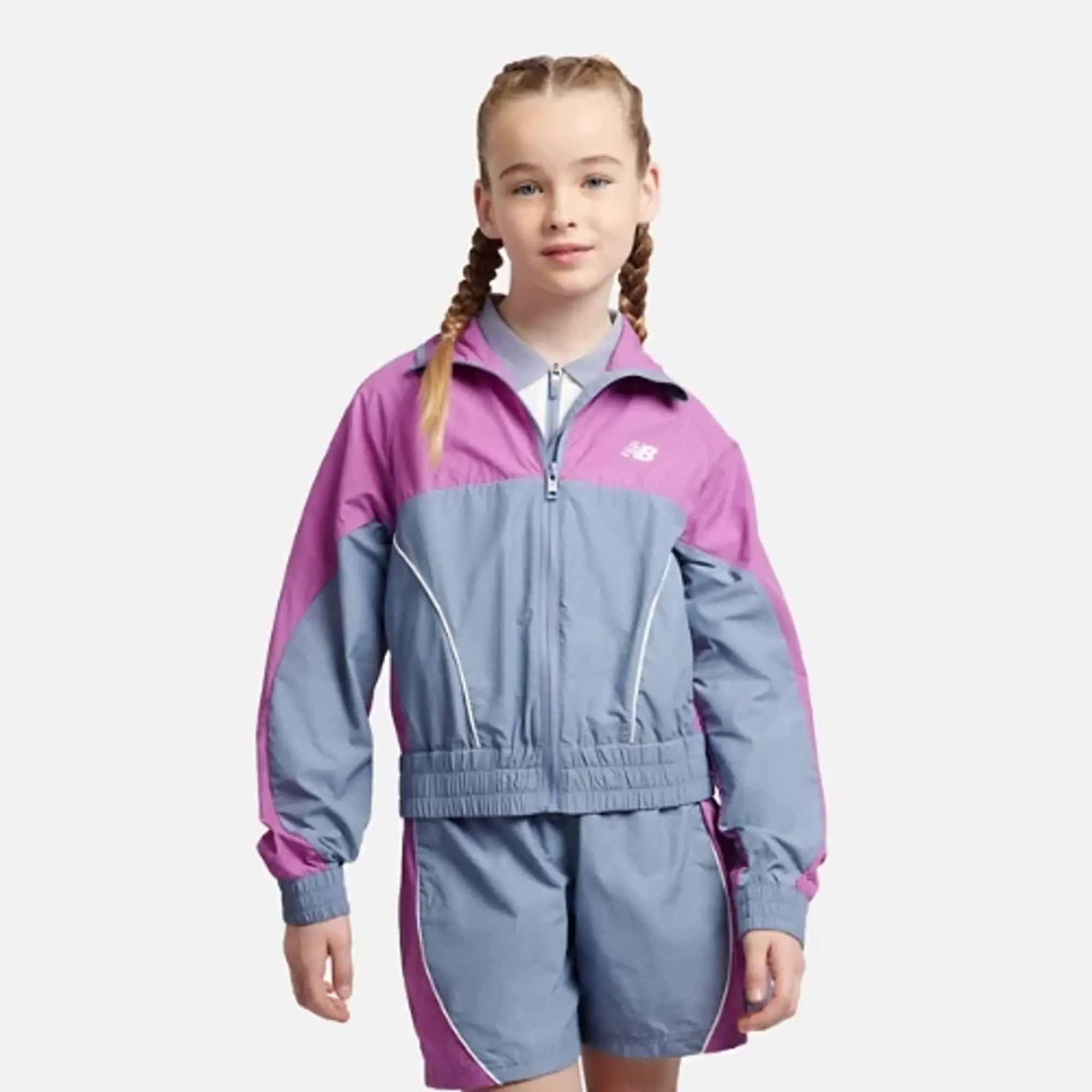 New Balance Girls Panelled Woven Track Jacket in Blue Nylon