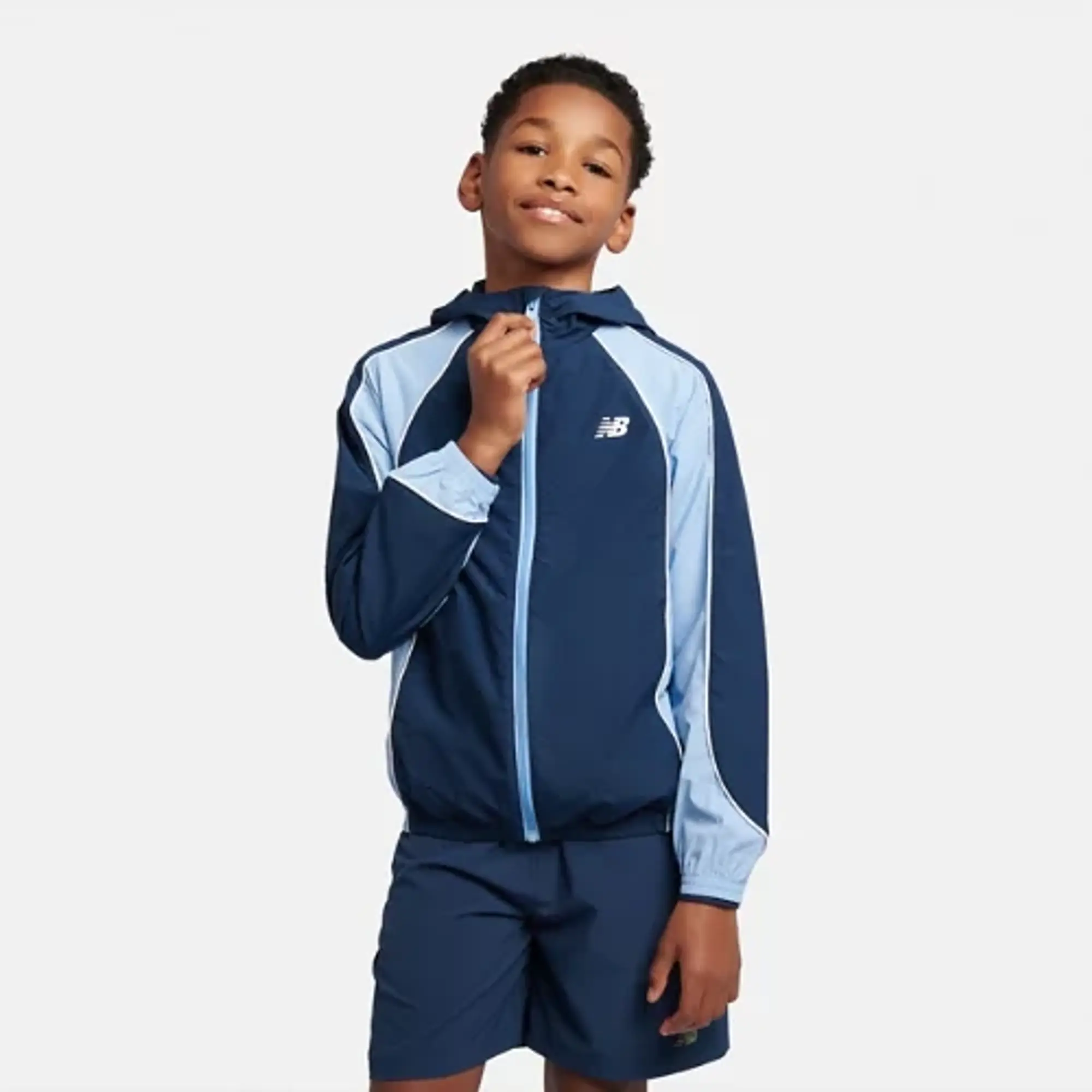 New Balance Boys Varsity Woven Jacket in Blue Nylon