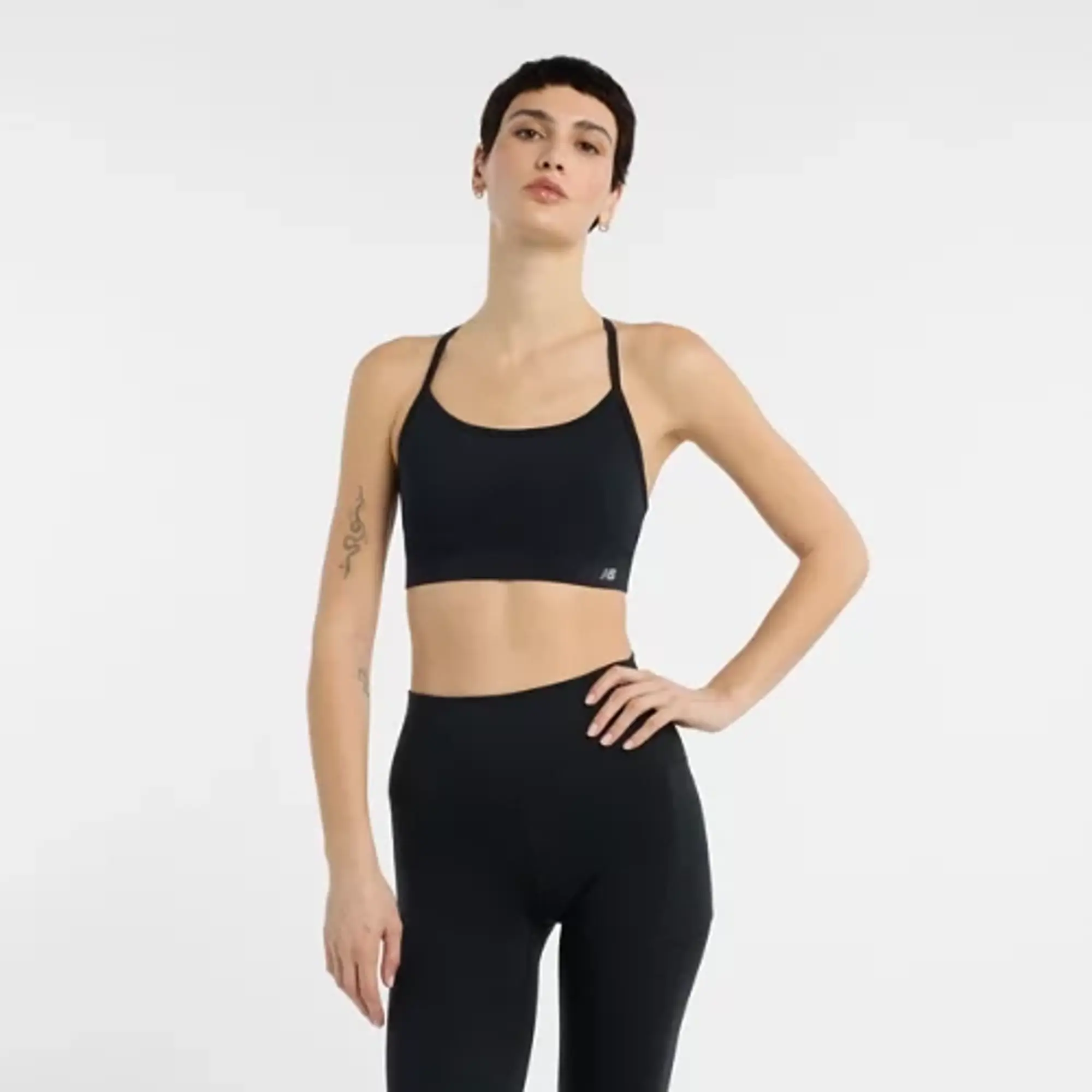 New Balance Women's NB Essential Yoga Bra in Black Poly Knit