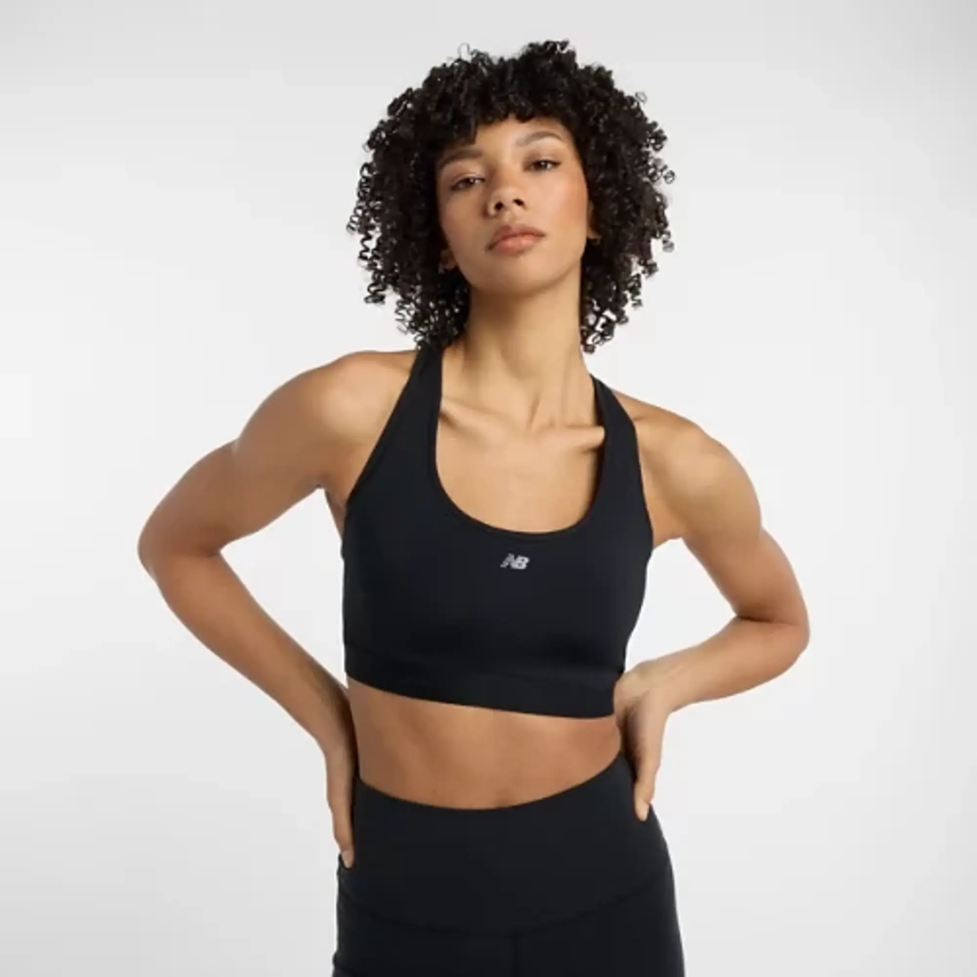 New Balance Women's NB Essential Run Bra in Black Poly Knit