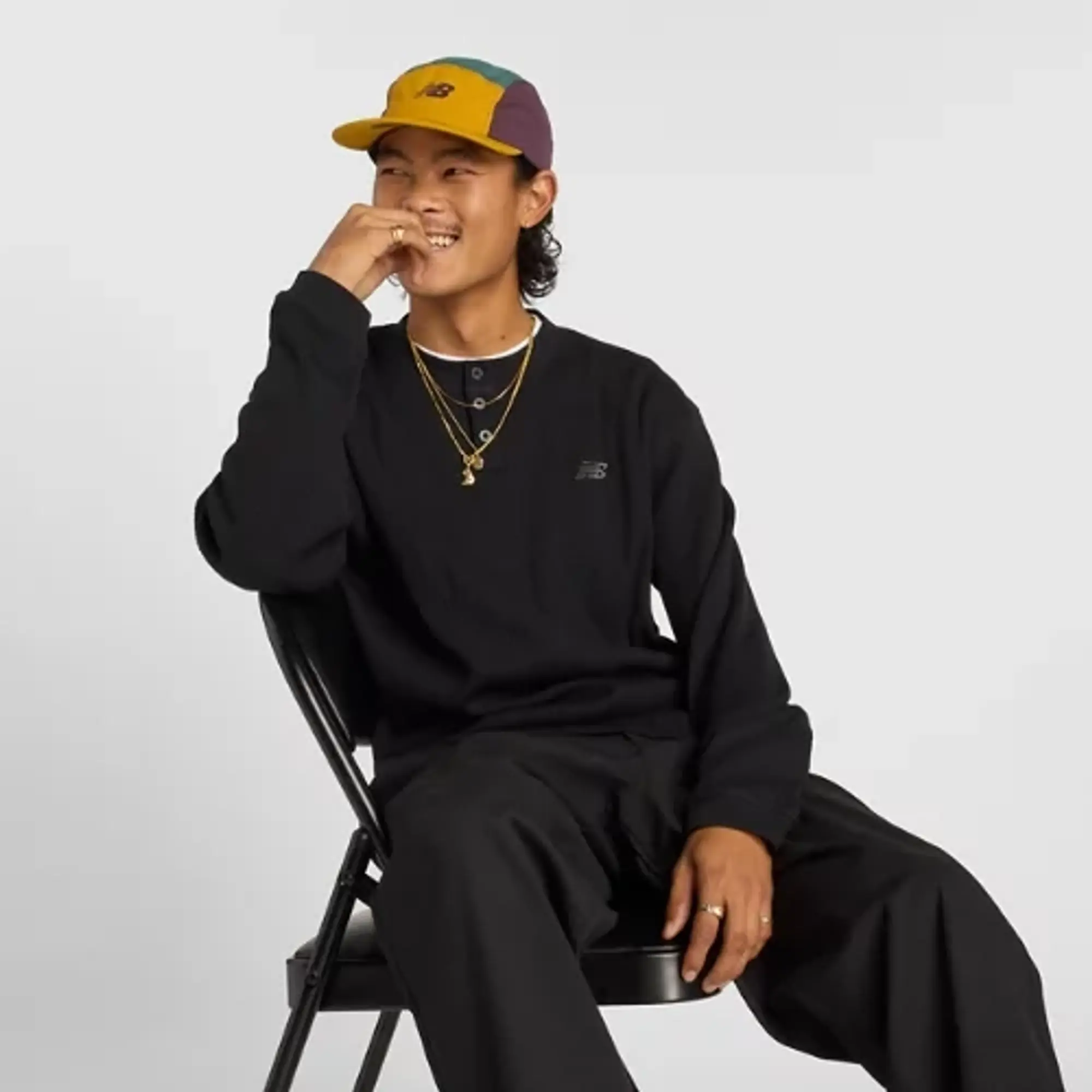 New Balance Men's Numeric Waffle Knit Long Sleeve Henley in Black Cotton