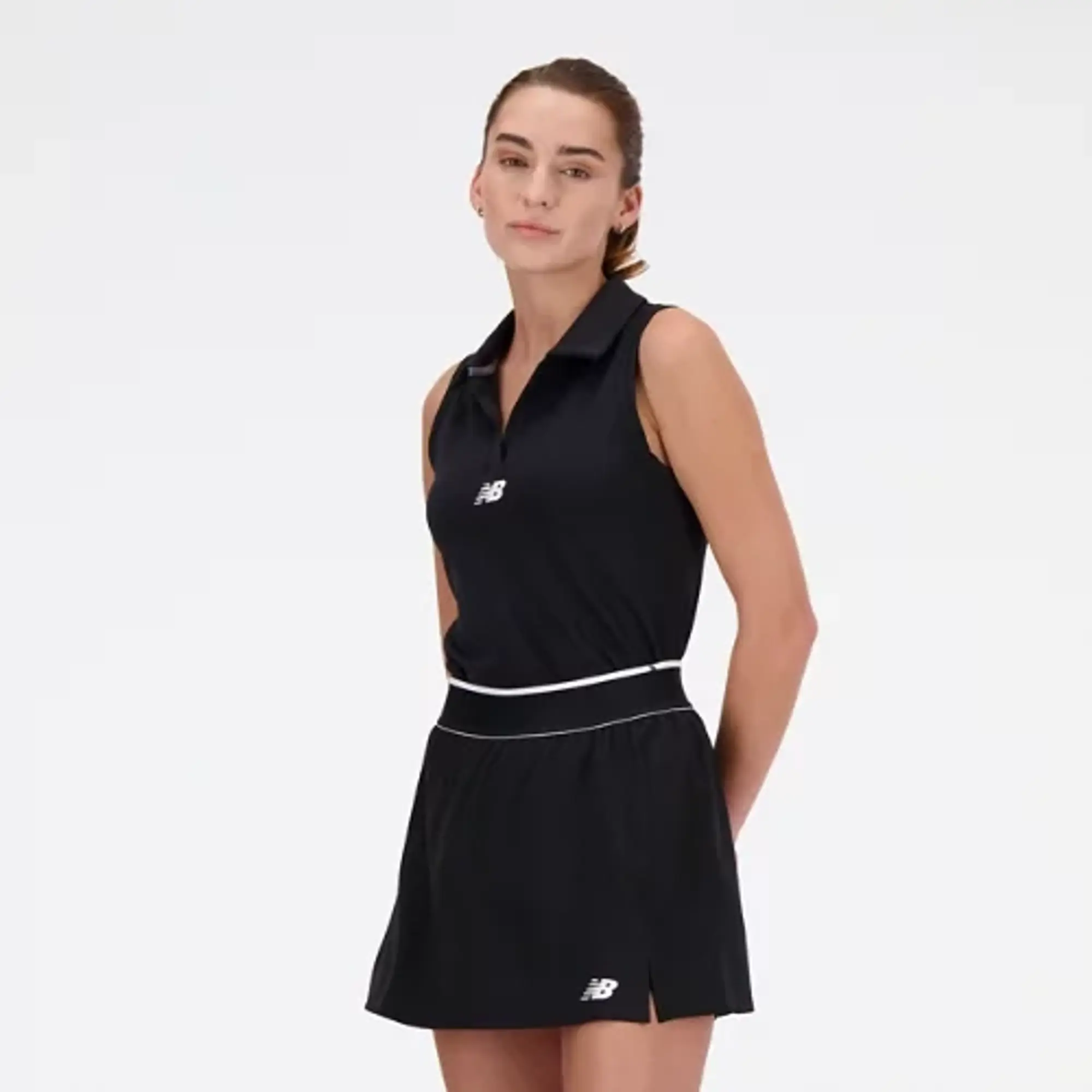 New Balance Women's Collared Tournament Tank in Black Poly Knit