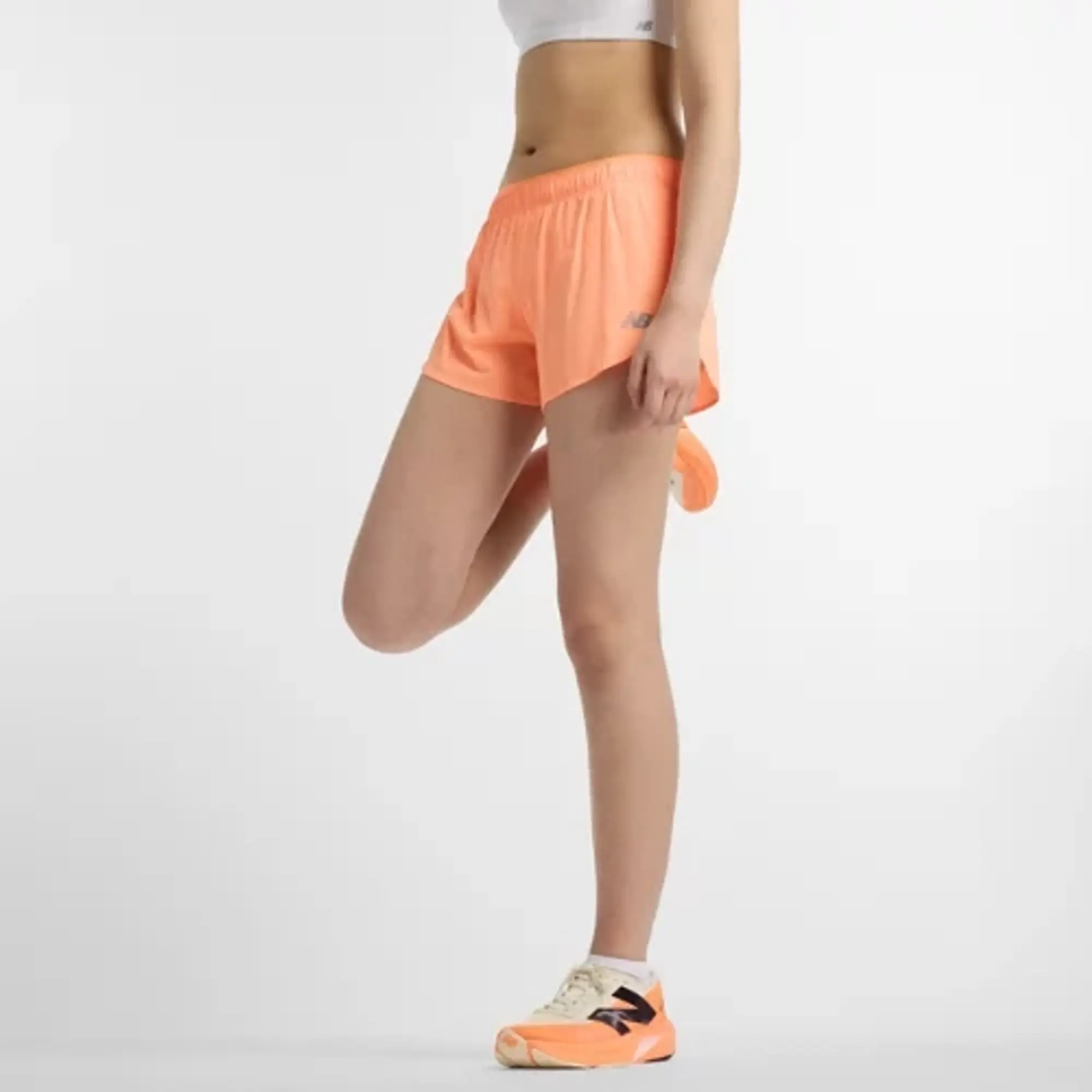 New Balance Women's RC Ultra Light Split Short 3" in Orange Polywoven