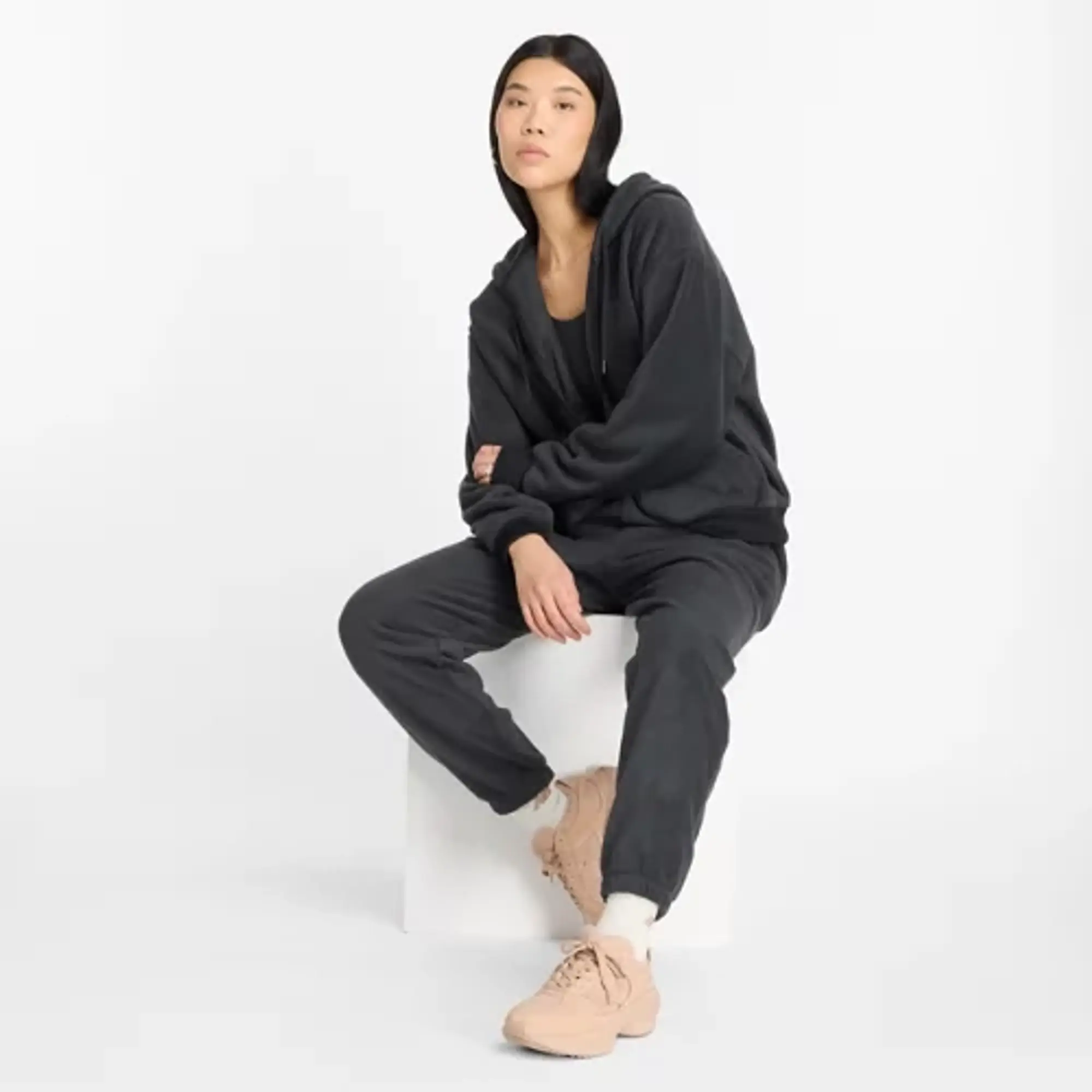 New Balance Women's Polar Fleece Pant in Black Poly Fleece