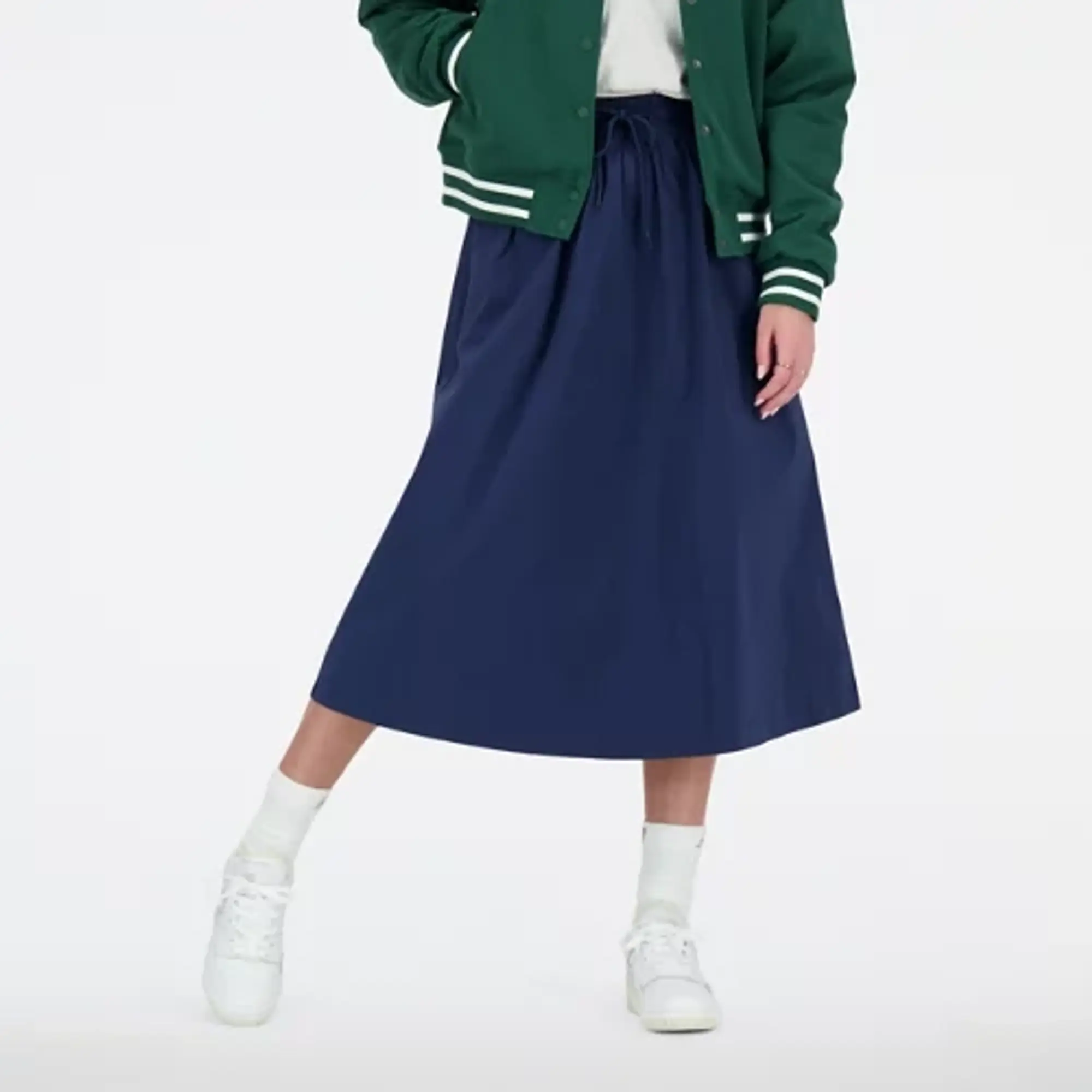 New Balance Women's Sportswear's Greatest Hits Skirt in Blue Polywoven
