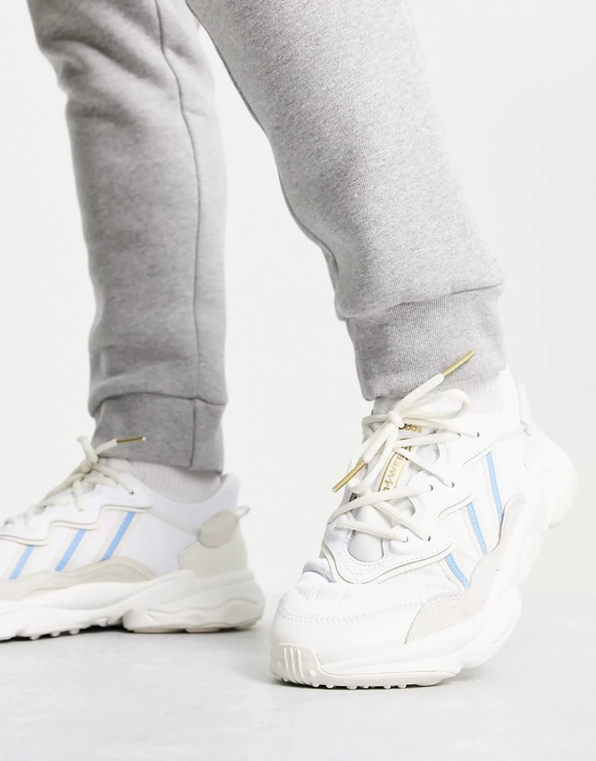 Adidas Originals Ozweego Trainers In Off White With Blue Detail