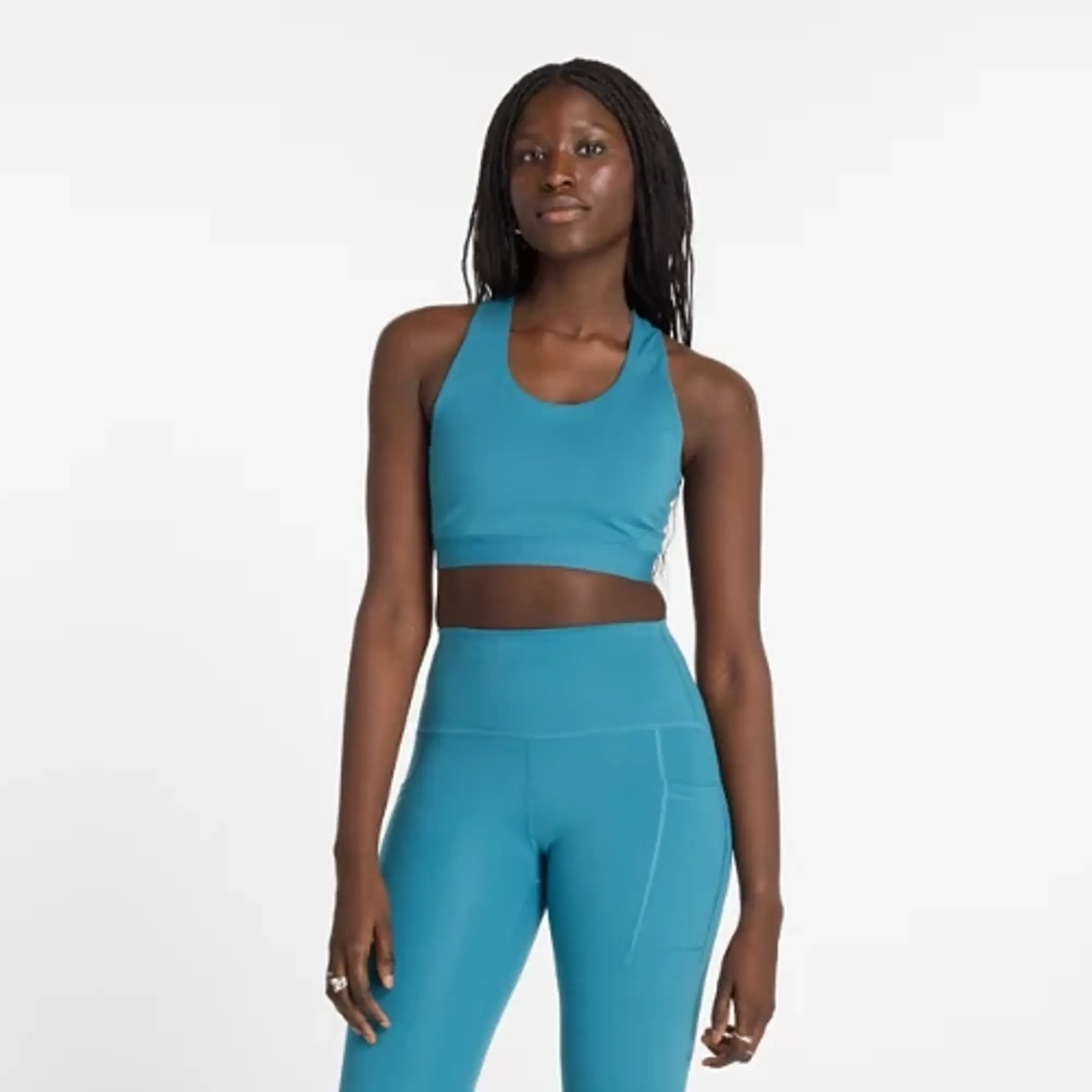New Balance Women's NB Sleek Medium Support Pocket Sports Bra in Blue Poly Knit