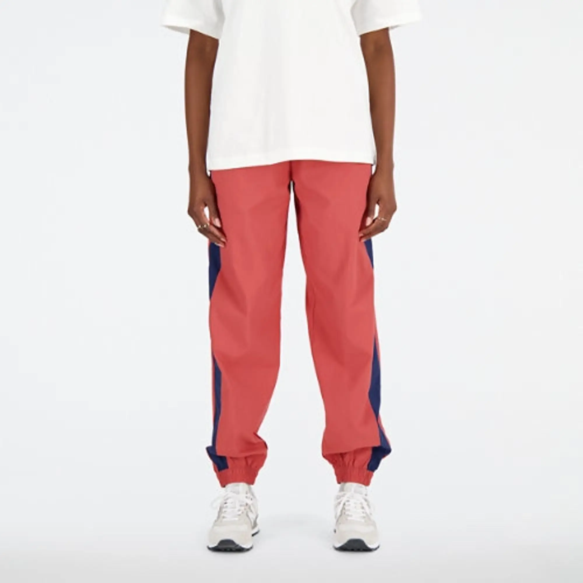 New Balance Women's Athletics Remastered Woven Pant in Red Polywoven