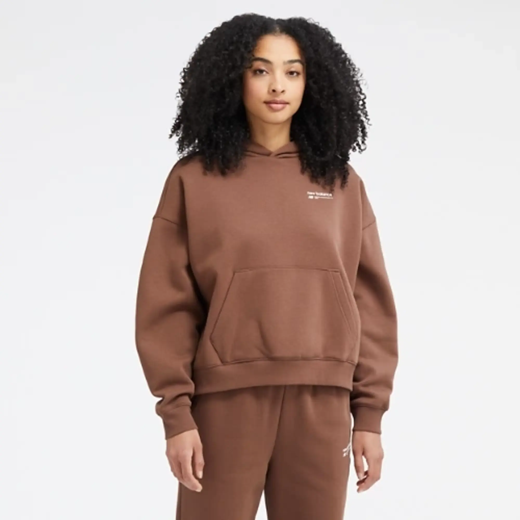 New Balance Women's Linear Heritage Brushed Back Fleece Hoodie in Brown Poly Fleece