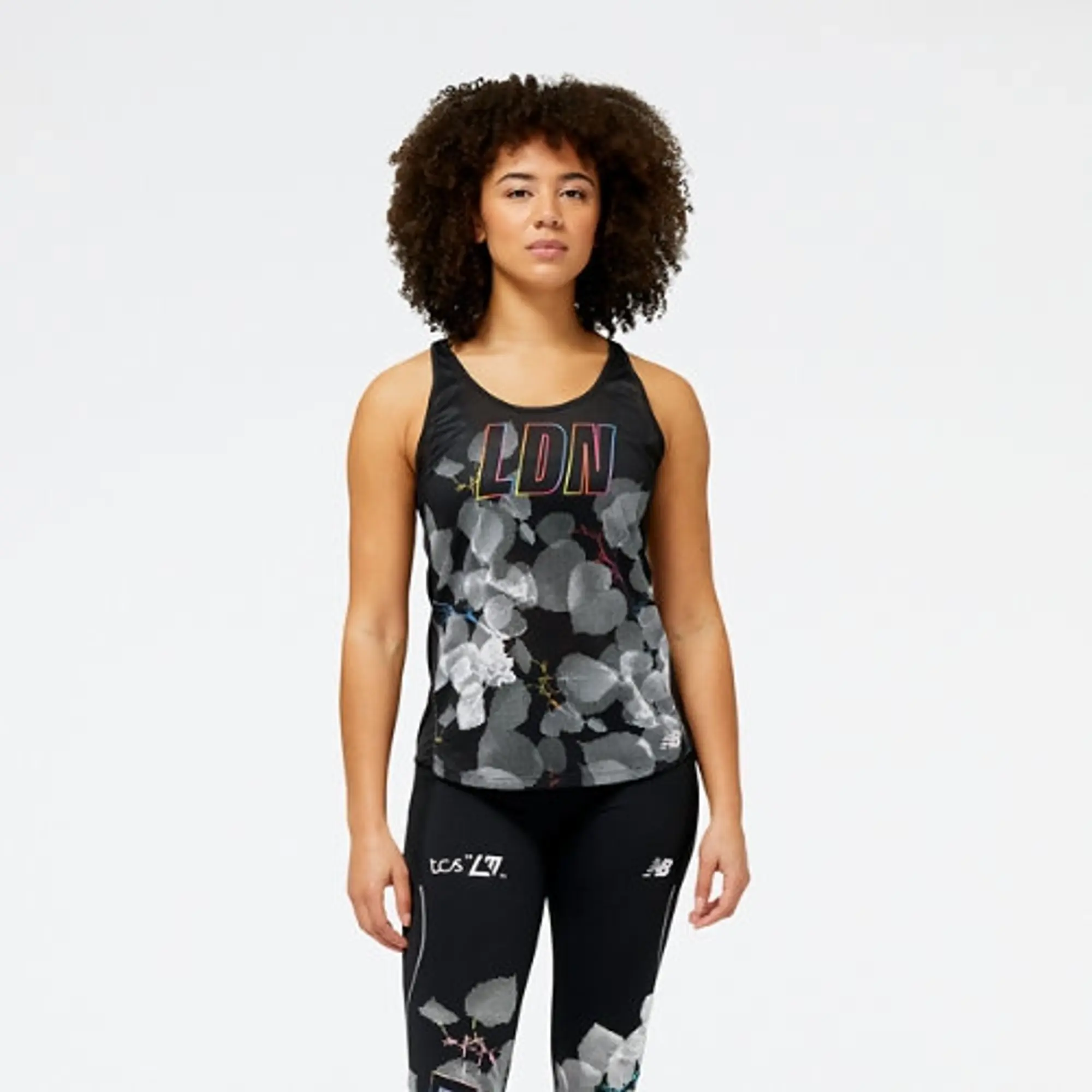 New Balance Women's London Edition Printed Impact Run Tank in Black Poly Knit