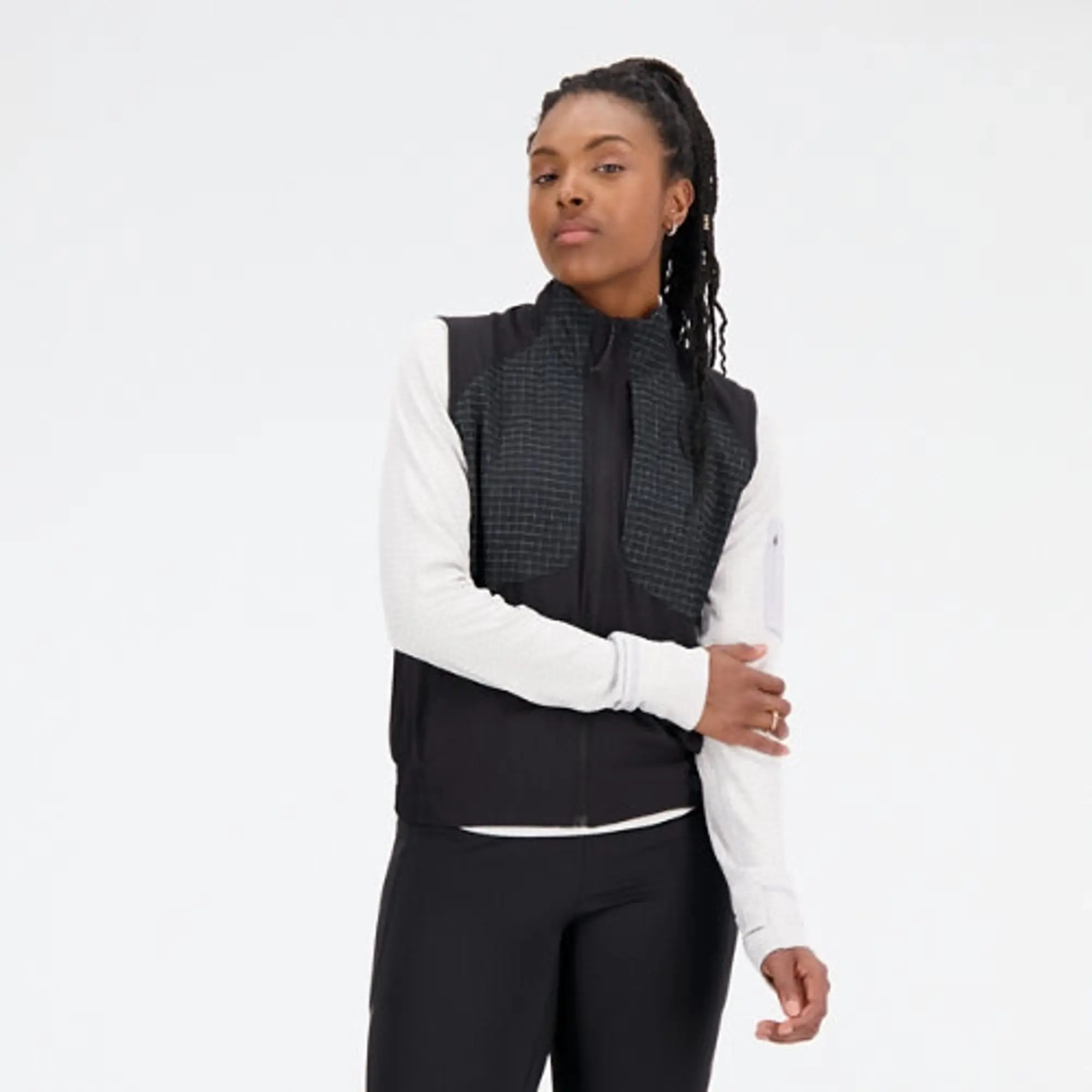 New Balance Women's Impact Run Luminous Packable Vest in Black Polywoven
