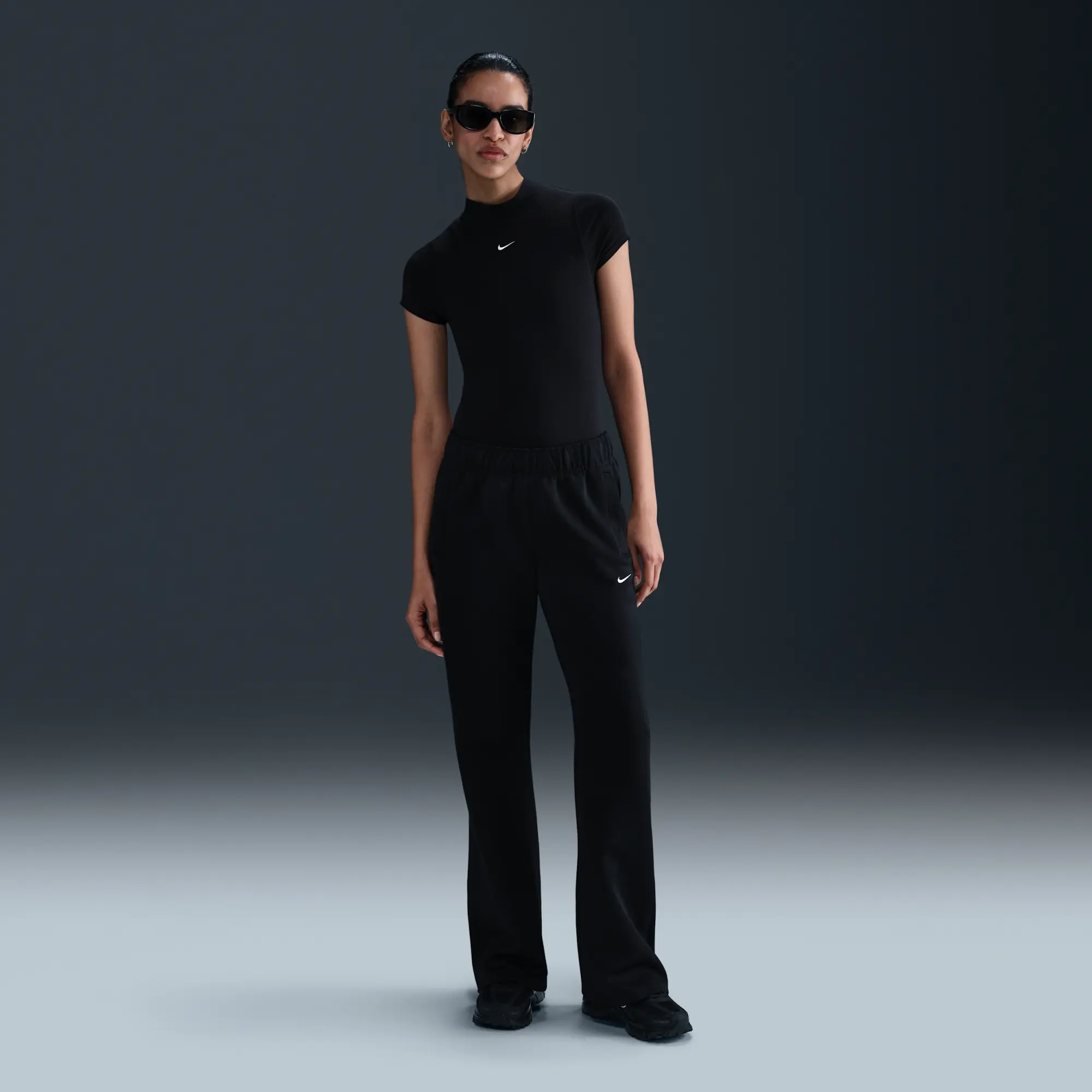 Nike Sportswear Windrunner Women's Mid-Rise Slim Knit Trousers - Black - Polyester/Elastane