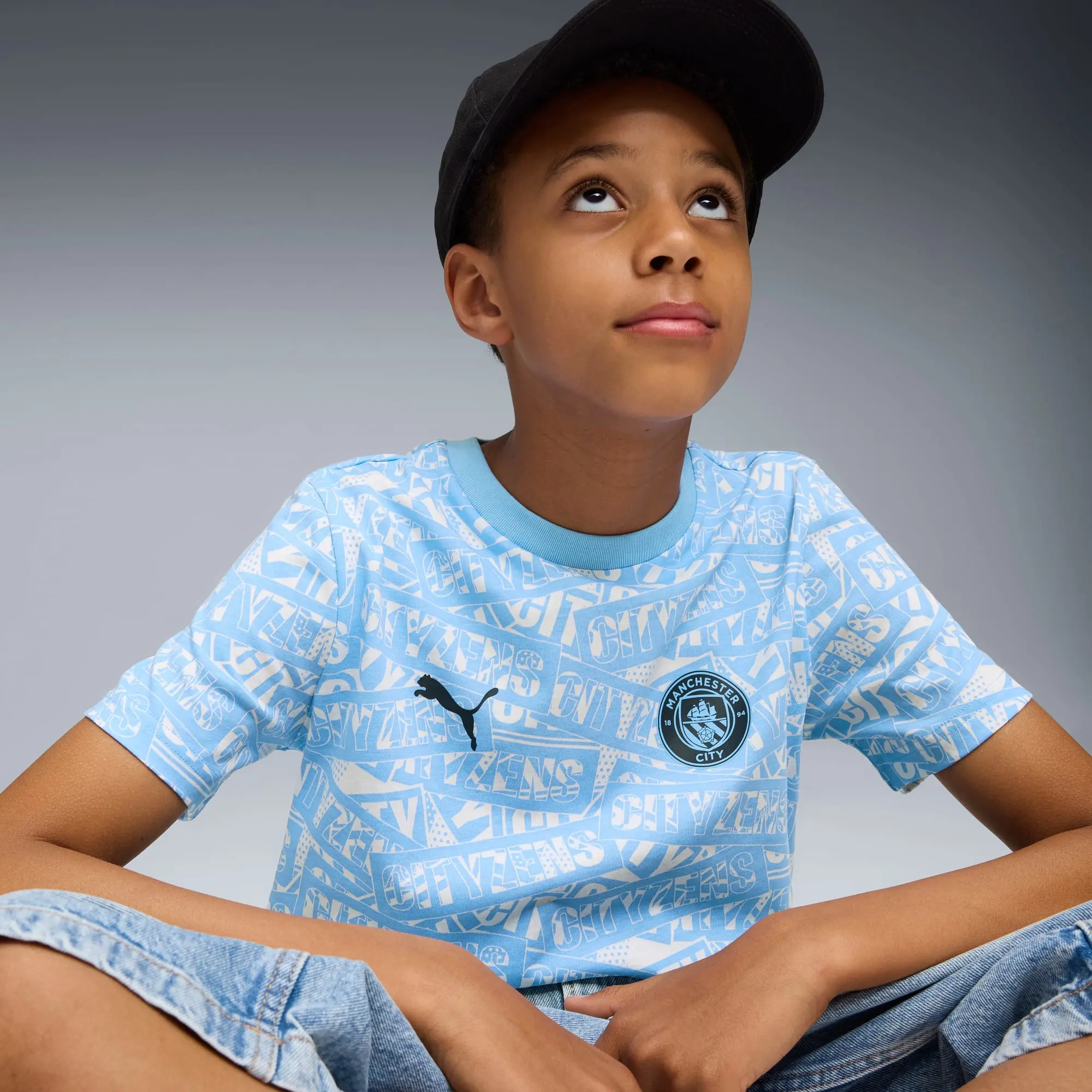 PUMA Manchester City Ftblculture All-Over Print T-Shirt Youth, Light Blue/White, size 11-12 Youth