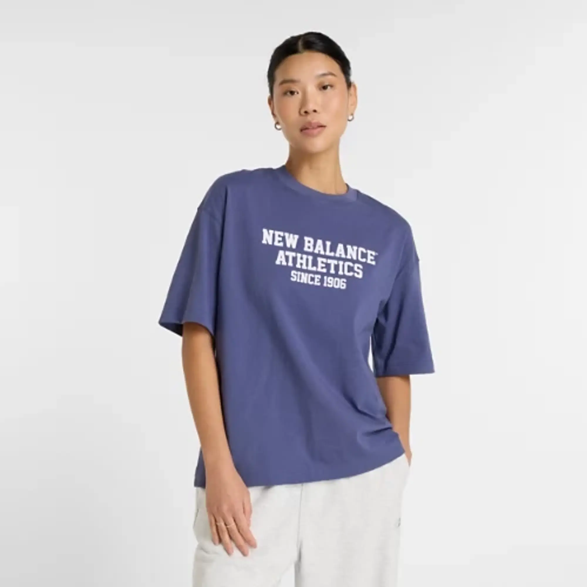 New Balance Women's Athletics Varsity Oversized T-Shirt in Blue Cotton
