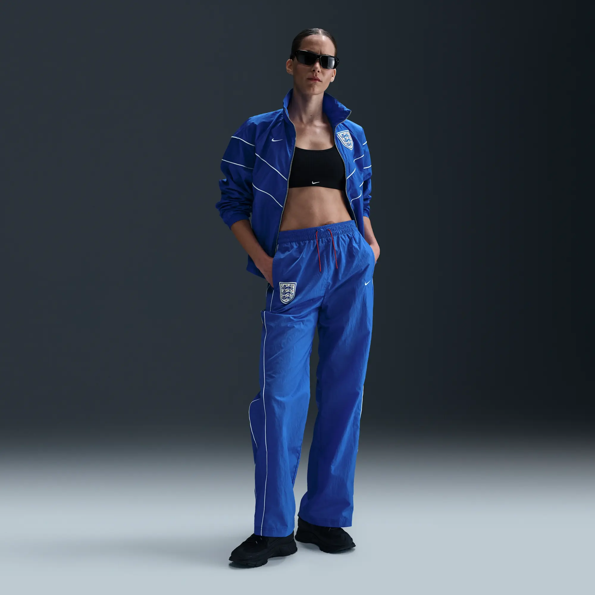 England Windrunner Women's Nike Football High-Waisted Woven Pants - Blue - Nylon