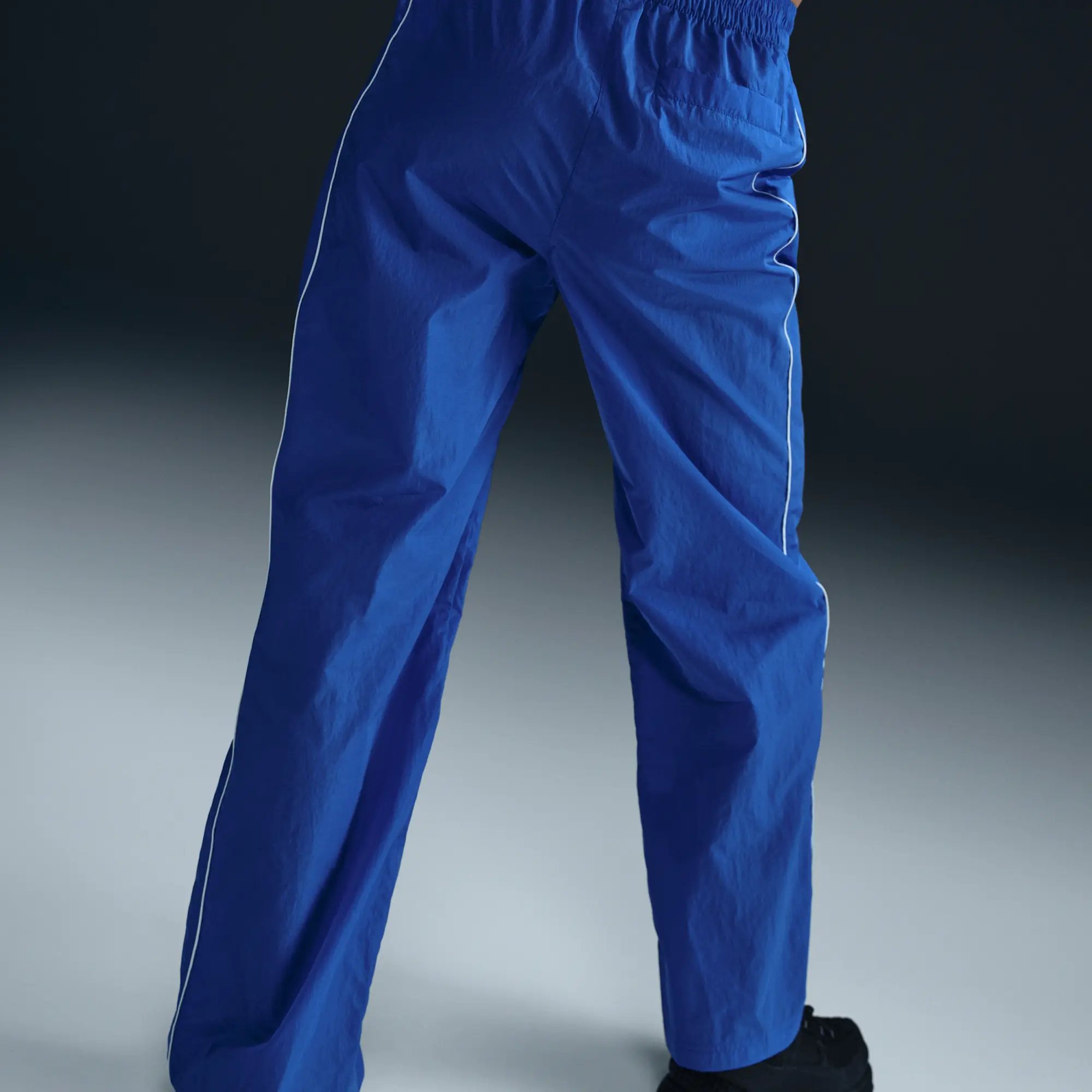 England Windrunner Women's Nike Football High-Waisted Woven Pants - Blue - Nylon