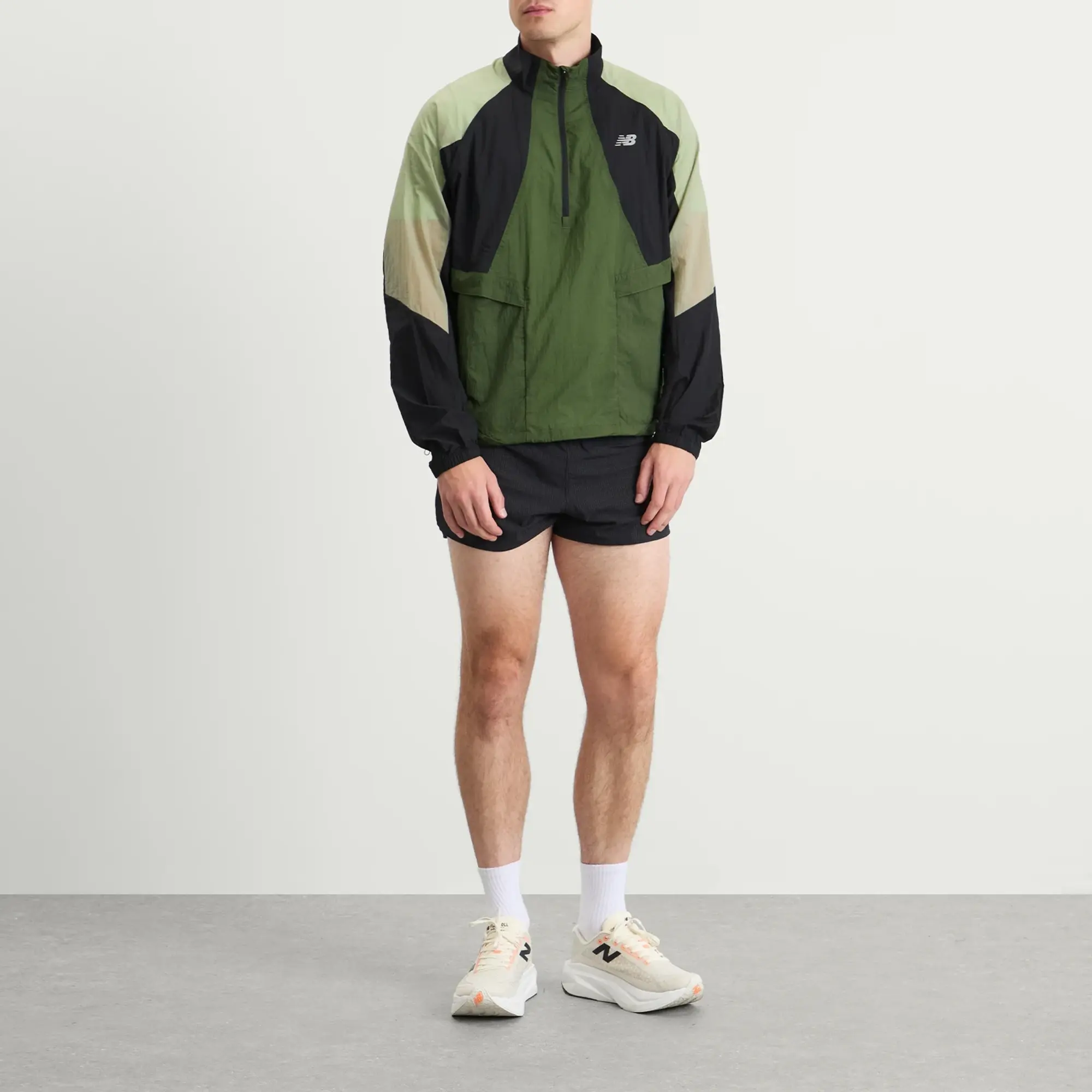 New Balance Men's Better Run Water Resistant Jacket in Brown Polywoven