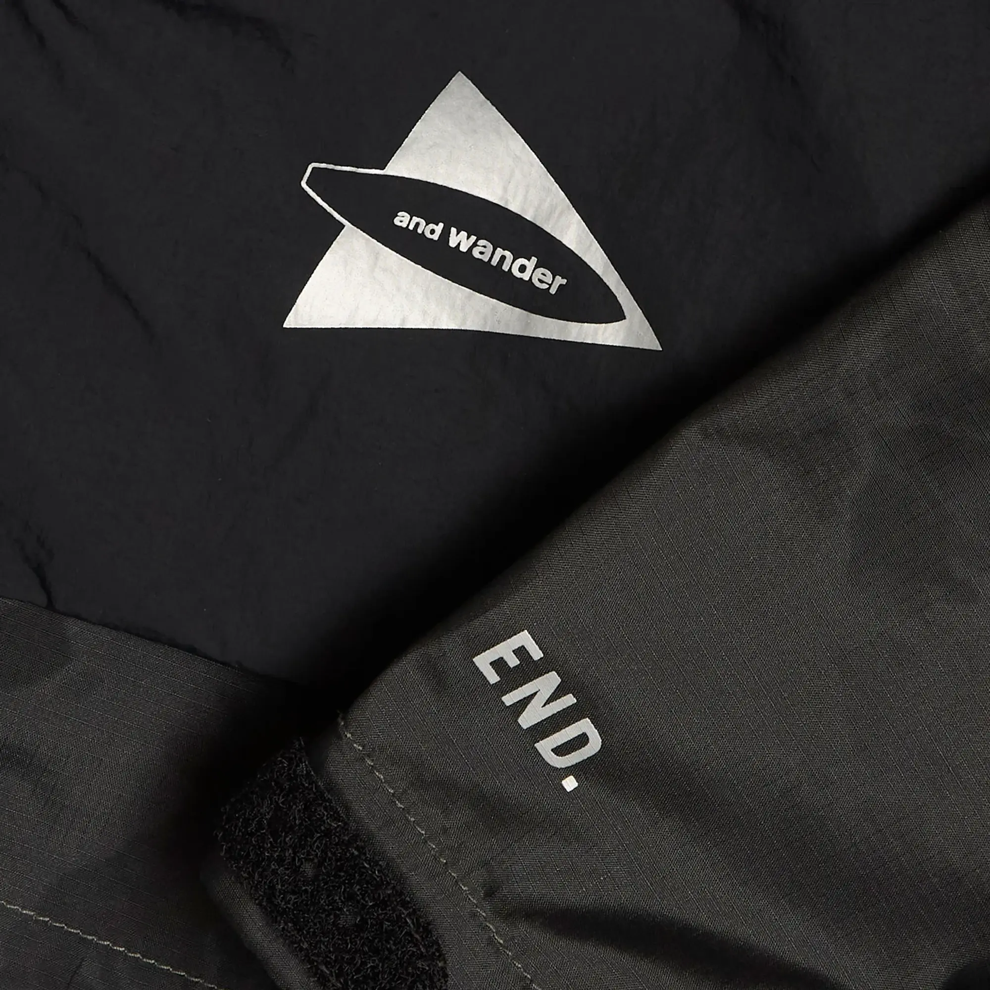 END. x and wander Nylon Print Jacket Charcoal