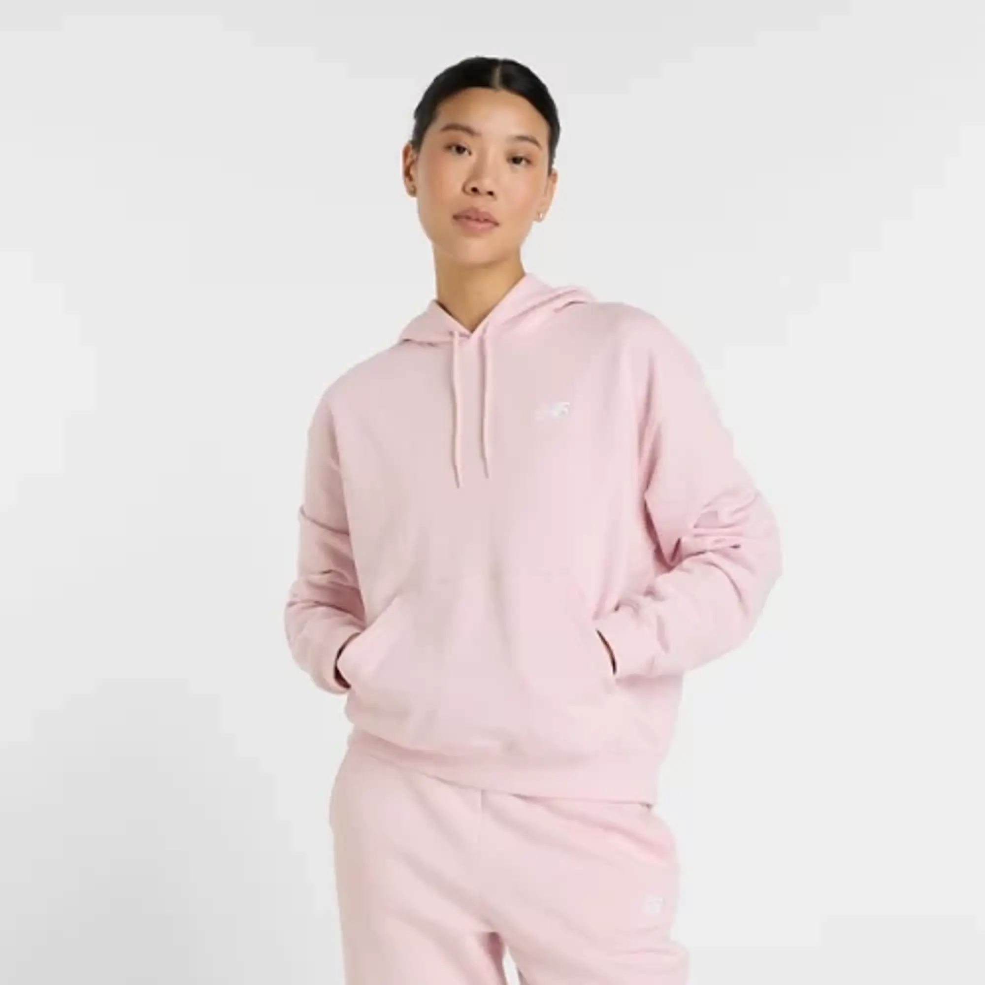 New Balance Women's Sport Essentials French Terry Hoodie in Pink Cotton Fleece