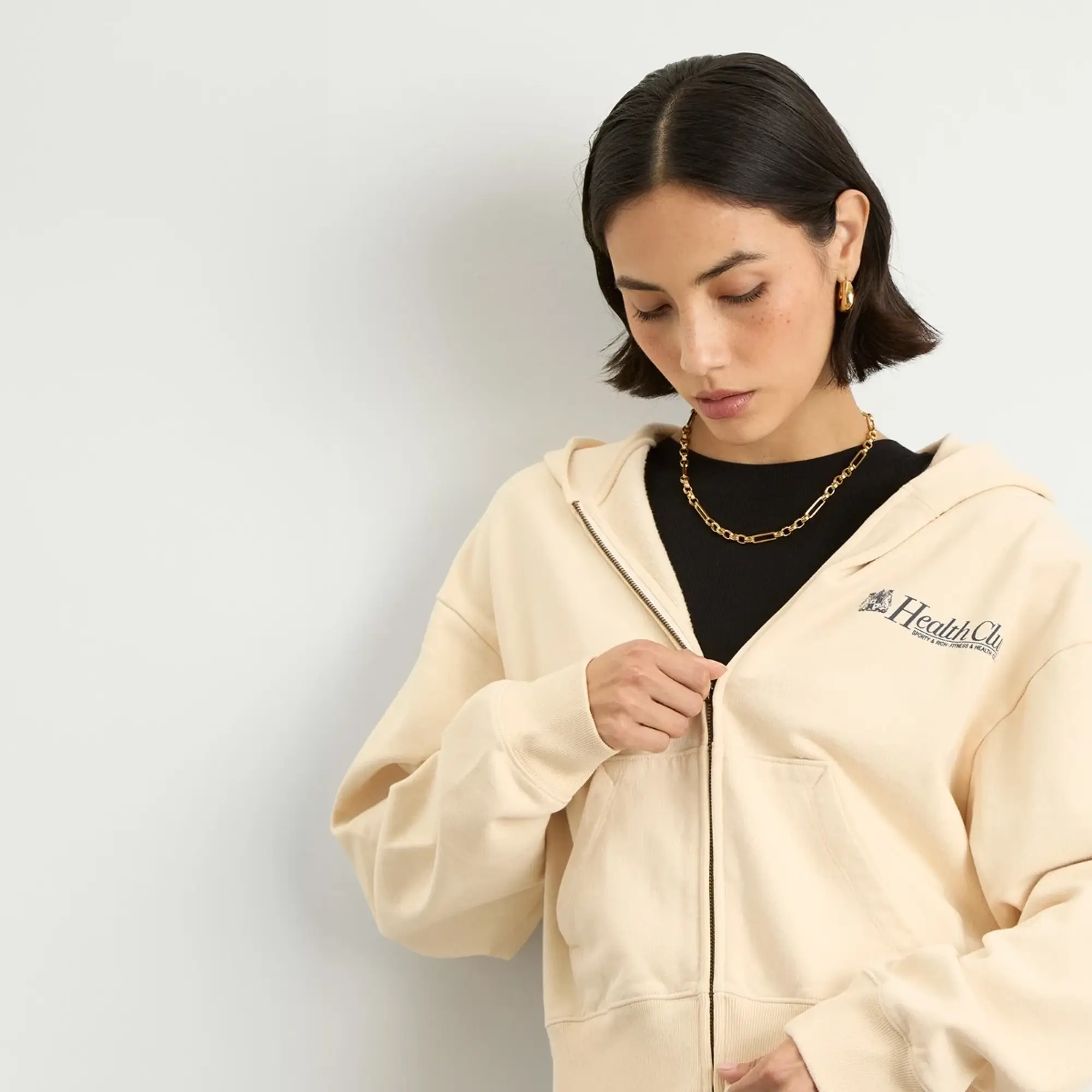 Sporty & Rich Women's Lion Health Cropped Zip Hoodie Cream