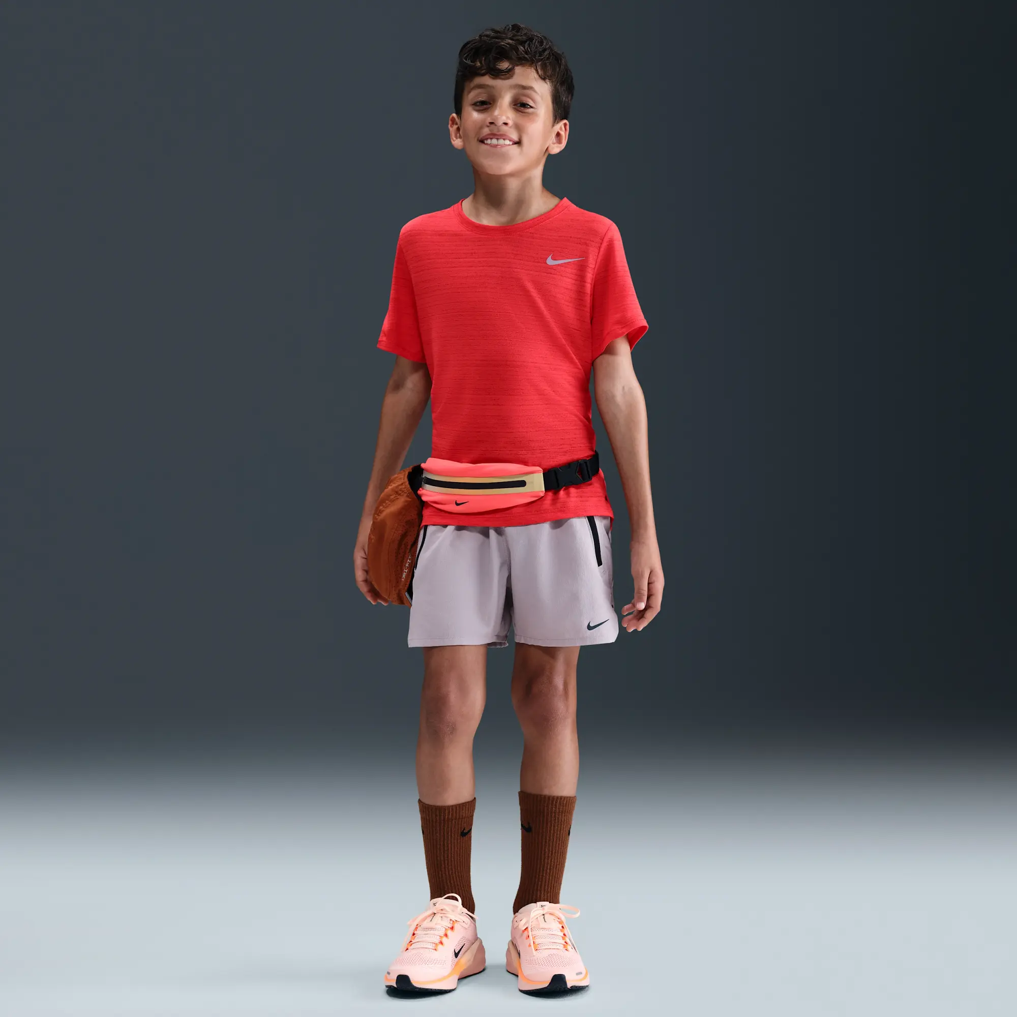 Nike Dri-FIT Miler Older Kids' (Boys') Training Top - Red - Sustainable Materials