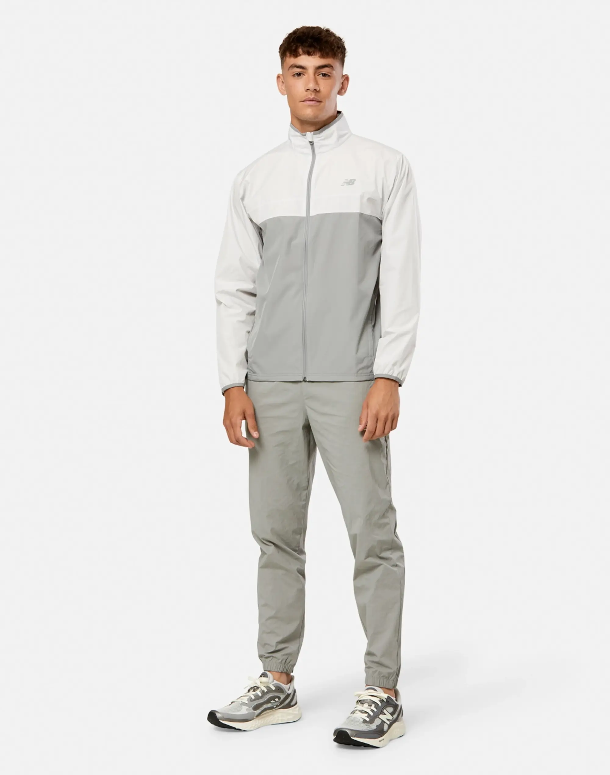 Men's New Balance Sports Essentials Run Jacket in Grey/White 