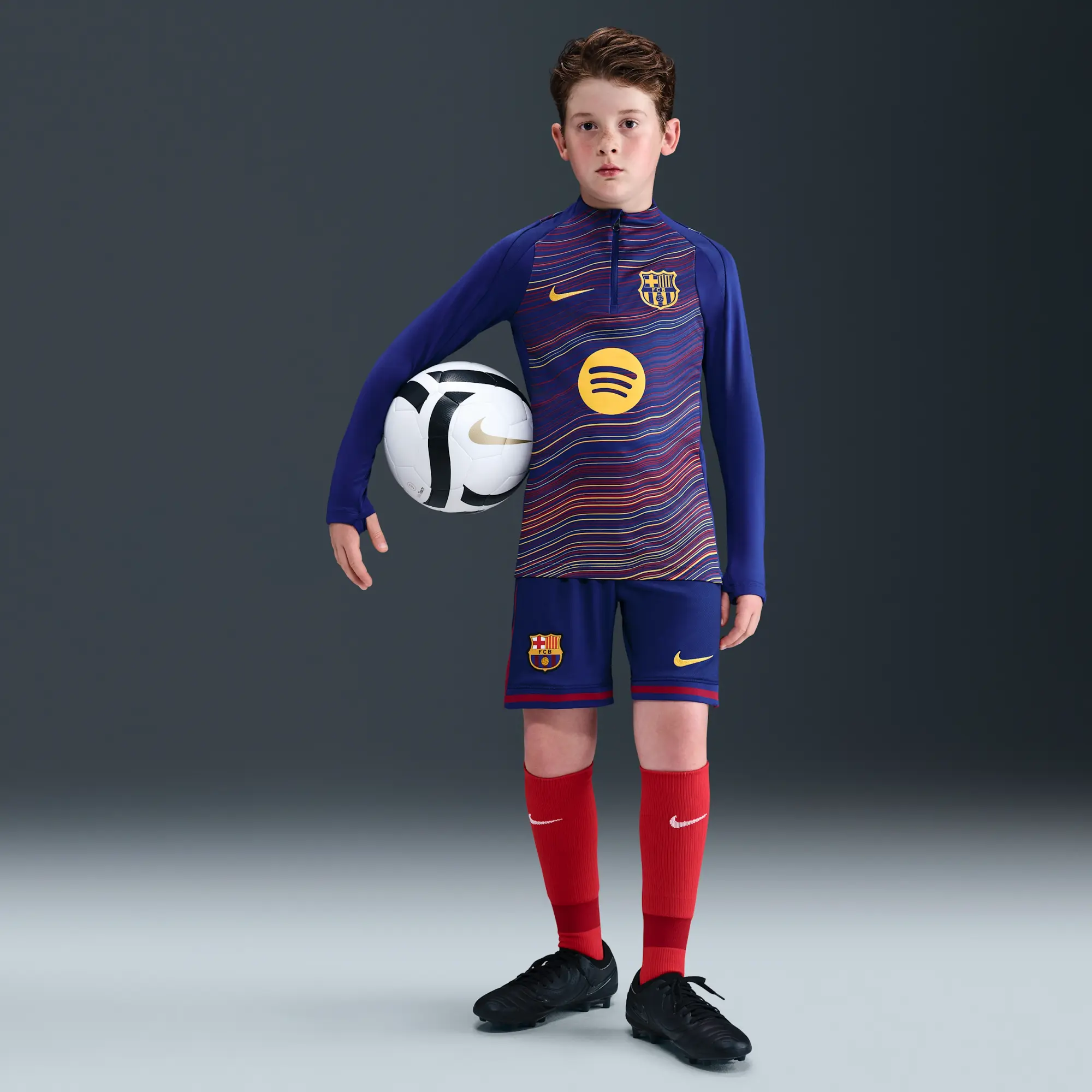 F.C. Barcelona Strike Home Older Kids' Nike Dri-FIT Football Pre-Match Drill Top - Blue - Polyester/Elastane